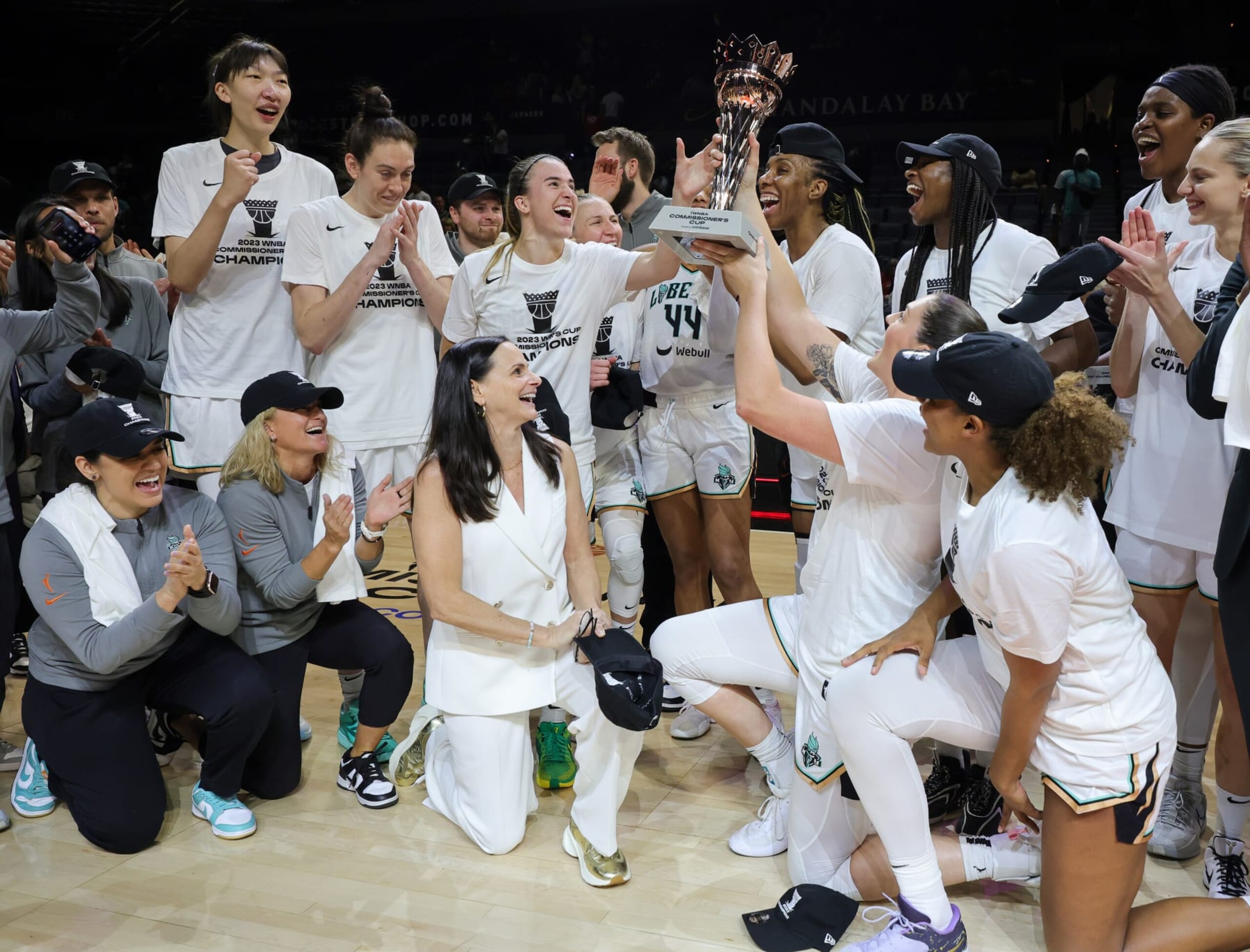 LAS VEGAS, NEVADA - AUGUST 15: The New York Liberty celebrate with the championship trophy after defeating the Las Vegas Aces 82-63 in the 2023 Commissioner's Cup Championship game at Michelob ULTRA Arena on August 15, 2023 in Las Vegas, Nevada. NOTE TO USER: User expressly acknowledges and agrees that, by downloading and or using this photograph, User is consenting to the terms and conditions of the Getty Images License Agreement. (Photo by Ethan Miller/Getty Images)