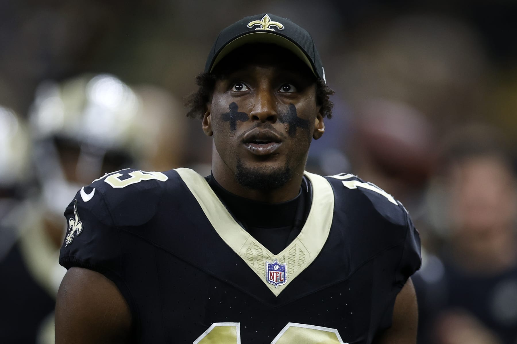 NEW ORLEANS, LOUISIANA - AUGUST 13: Michael Thomas #13 of the New Orleans Saints looks on during a preseason game at Caesars Superdome on August 13, 2023 in New Orleans, Louisiana. (Photo by Chris Graythen/Getty Images)