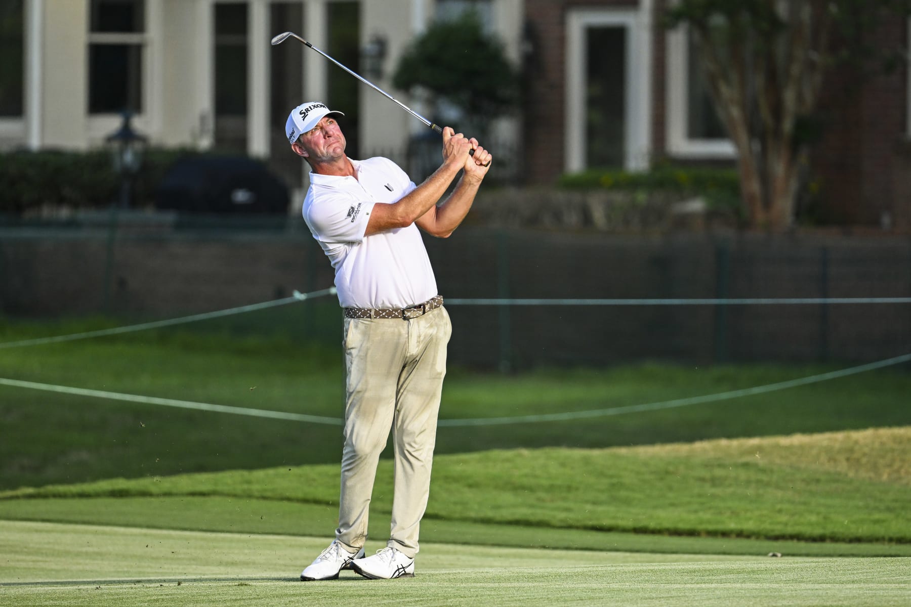 MEMPHIS, TENNESSEE - AUGUST 13:  Lucas Glover plays his third shot to the 17th hole green during the final round of the FedEx St. Jude Championship, the first event of the FedExCup Playoffs, at TPC Southwind on August 13, 2023 in Memphis, Tennessee. (Photo by Keyur Khamar/PGA TOUR via Getty Images)