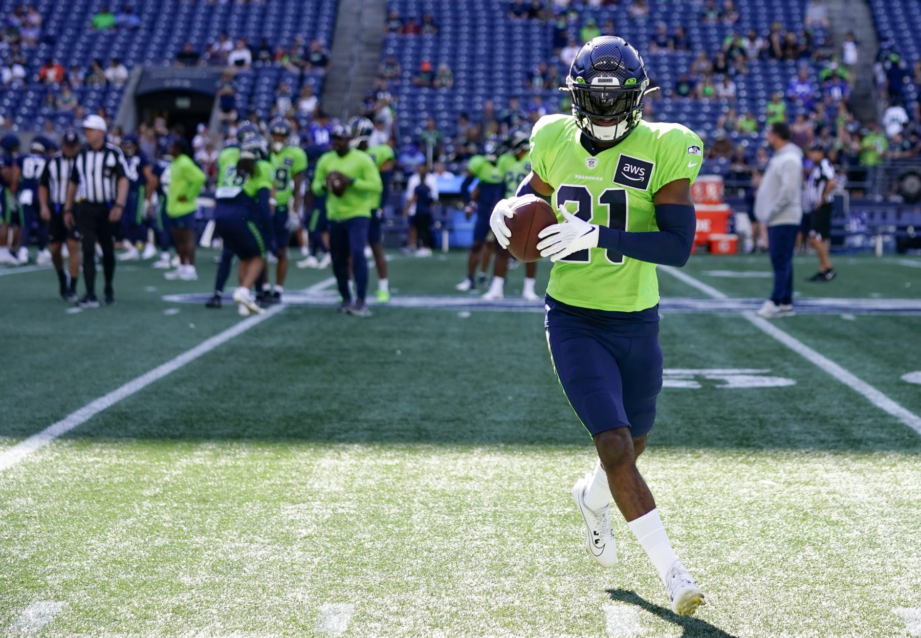 Seattle Seahawks cornerback Devon Witherspoon makes a catch during warmups before the NFL football team's mock game, Friday, Aug. 4, 2023, in Seattle. (AP Photo/Lindsey Wasson)