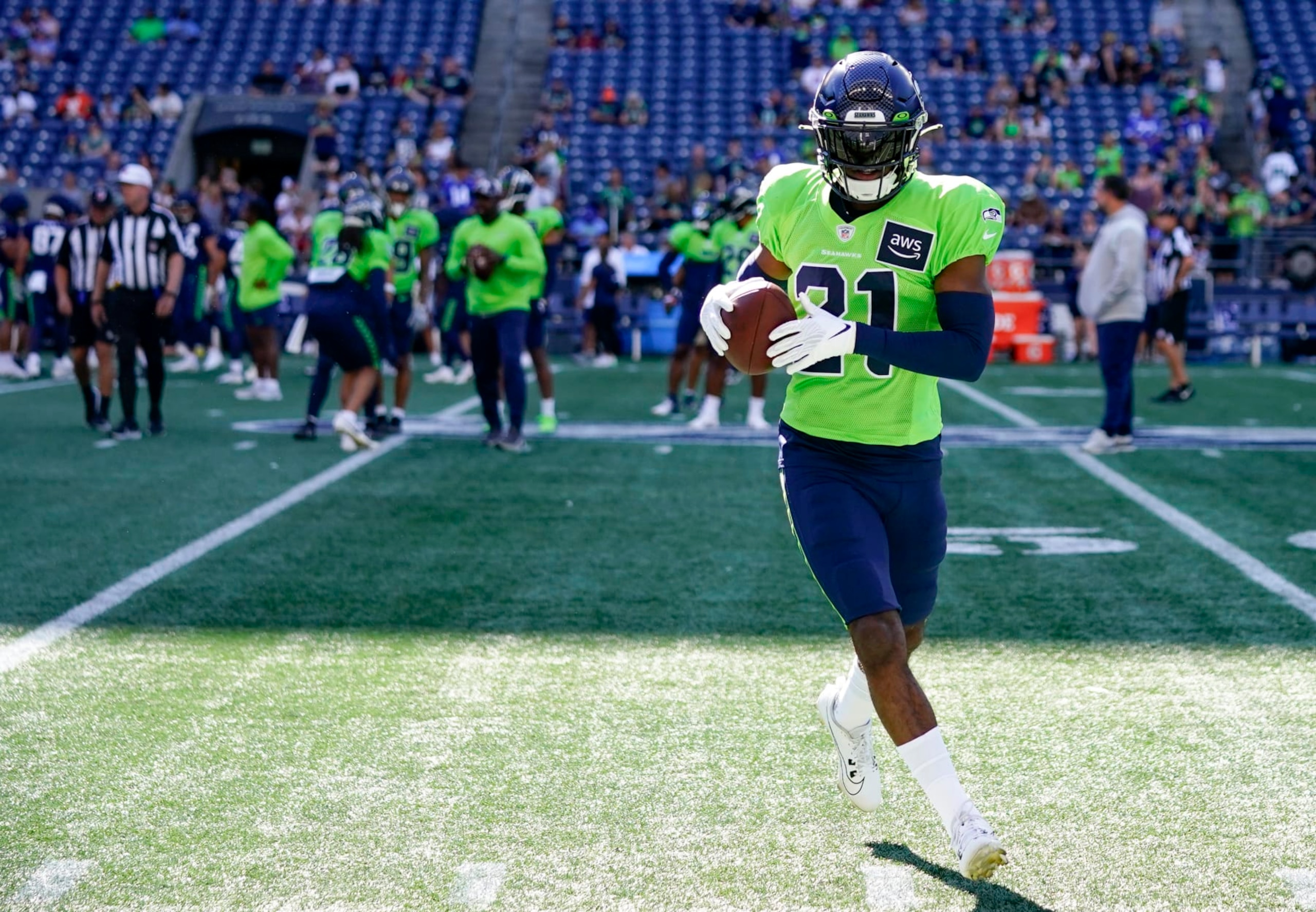 Seattle Seahawks cornerback Devon Witherspoon makes a catch during warmups before the NFL football team's mock game, Friday, Aug. 4, 2023, in Seattle. (AP Photo/Lindsey Wasson)