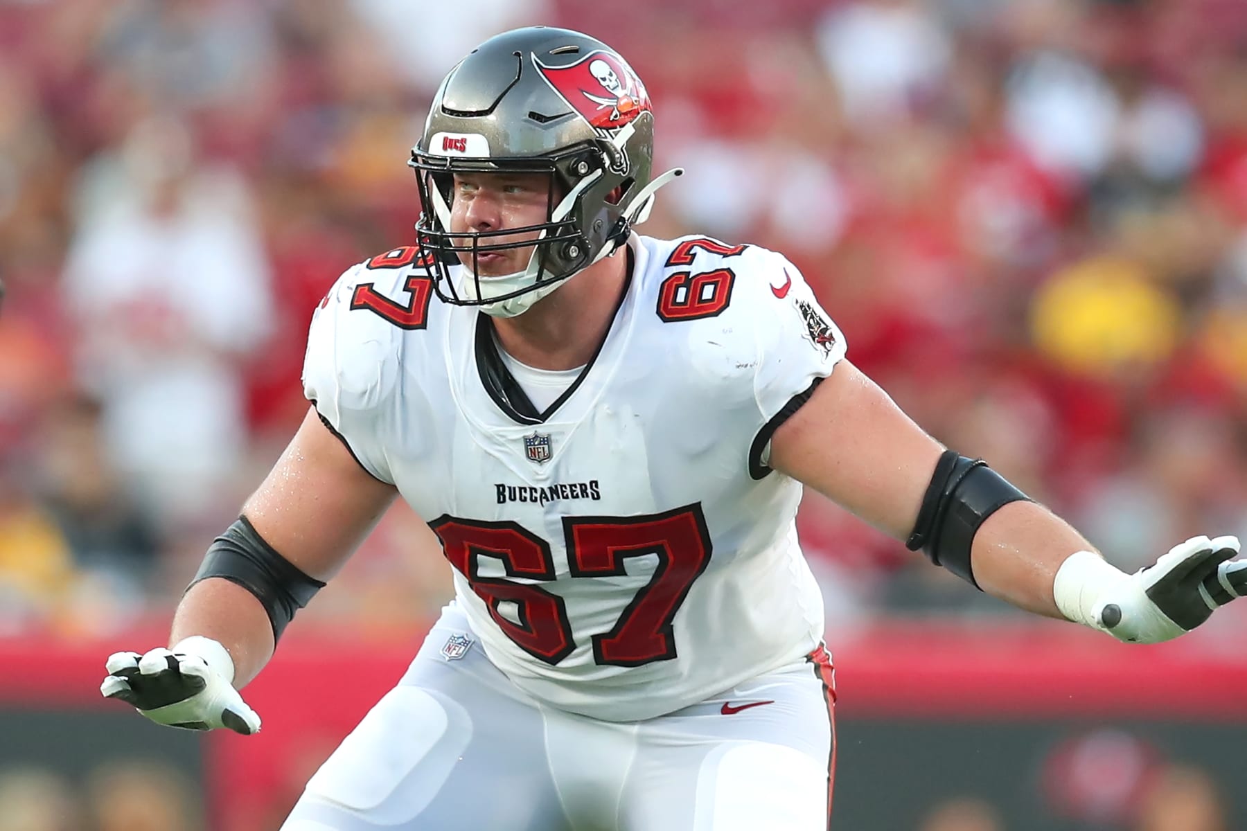 TAMPA, FL - AUGUST 11: Tampa Bay Buccaneers Offensive Tackle Luke Goedeke (67) pass blocks during the preseason game between the Pittsburgh Steelers and the Tampa Bay Buccaneers on August 11, 2023 at Raymond James Stadium in Tampa, Florida. (Photo by Cliff Welch/Icon Sportswire via Getty Images)