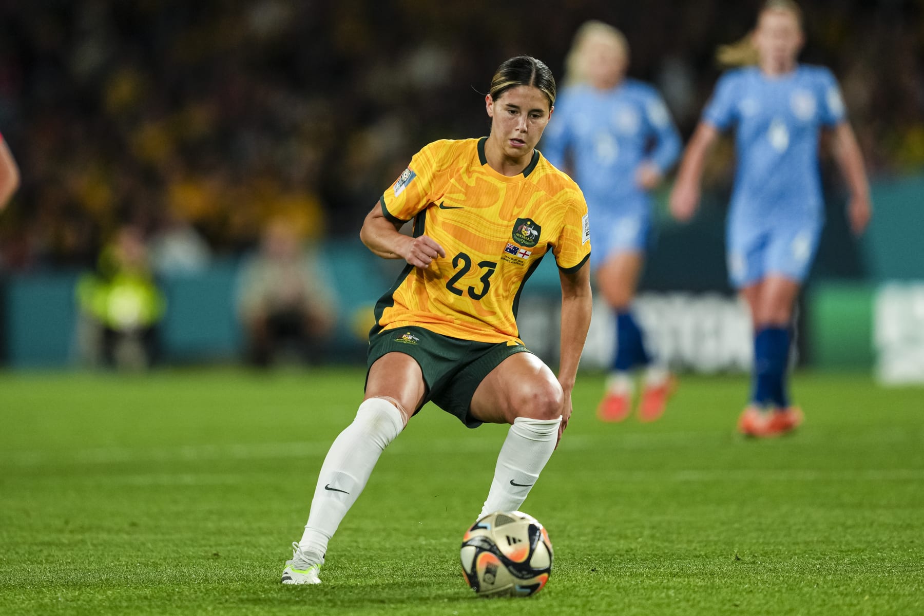 SYDNEY, AUSTRALIA - AUGUST 16: Kyra Cooney-Cross of Australia passes the ball during the FIFA Women's World Cup Australia & New Zealand 2023 Semi Final match between Australia and England at Stadium Australia on August 16, 2023 in Sydney, Australia. (Photo by Daniela Porcelli/Eurasia Sport Images/Getty Images)