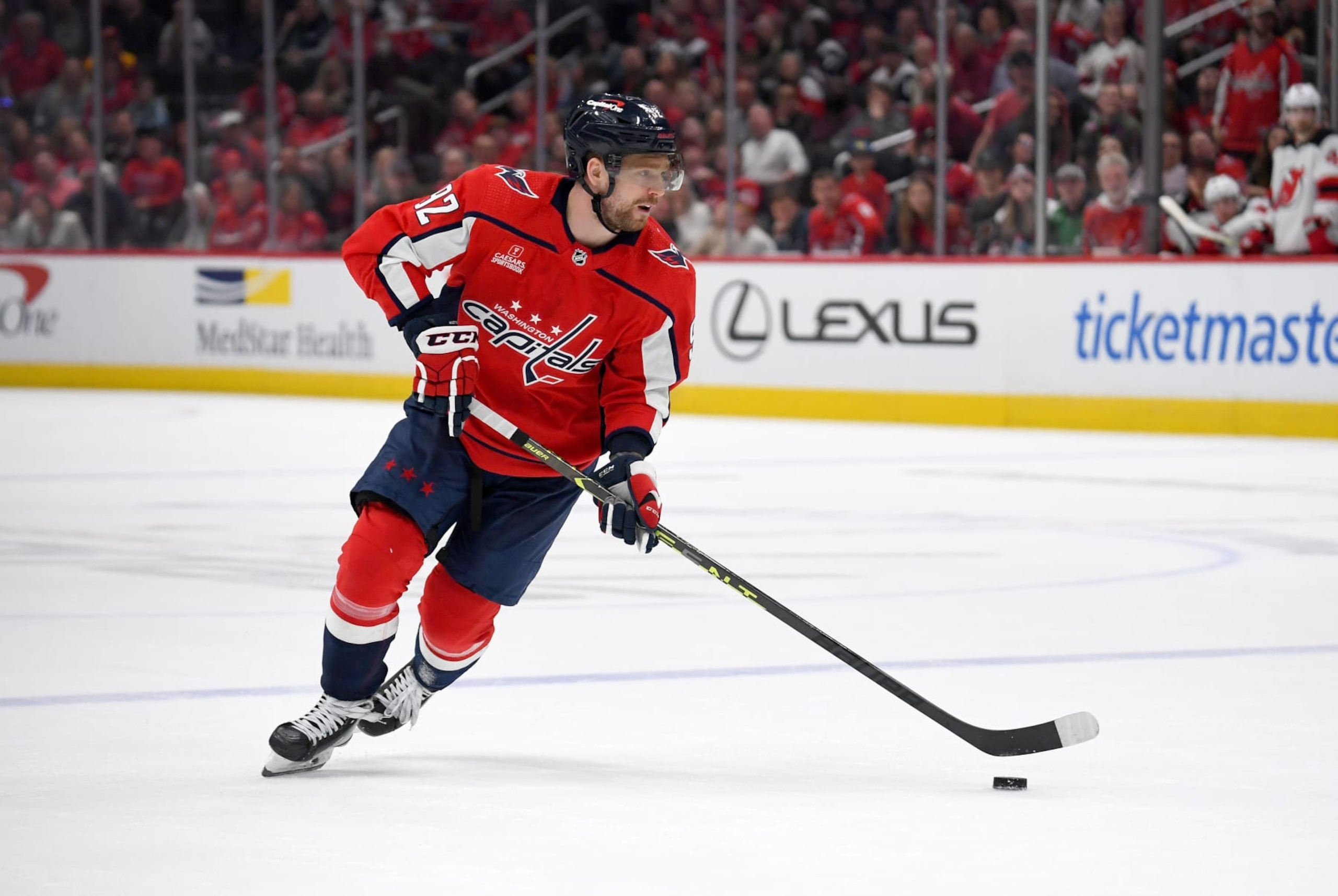WASHINGTON, DC - APRIL 13: Capitals center Evgeny Kuznetsov (92) stickhandles into the offensive zone during the New Jersey Devils versus Washington Capitals National Hockey League game on April 13, 2023 at Capital One Arena in Washington, D.C.. (Photo by Randy Litzinger/Icon Sportswire via Getty Images)