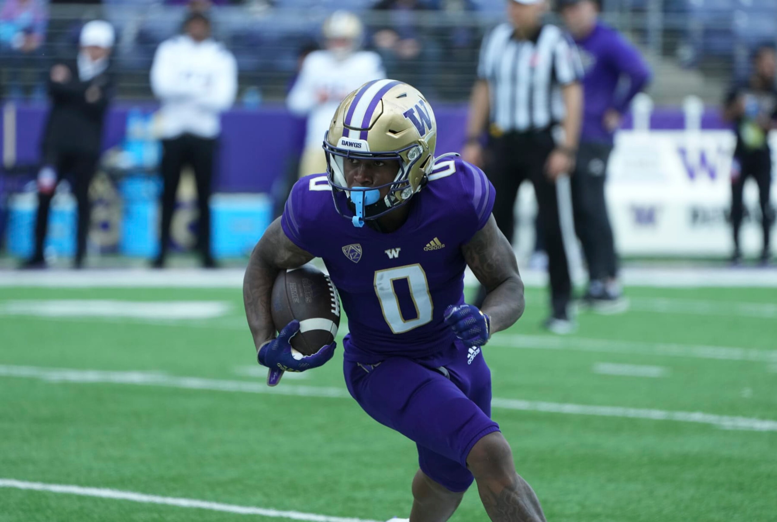 Seattle, WA - APRIL 22: Washington Husky receiver Giles Jackson (0) runs the ball during the Washington Husky Spring game on April 22, 2023 at Husky Stadium in Seattle, WA. (Photo by Jeff Halstead/Icon Sportswire via Getty Images)