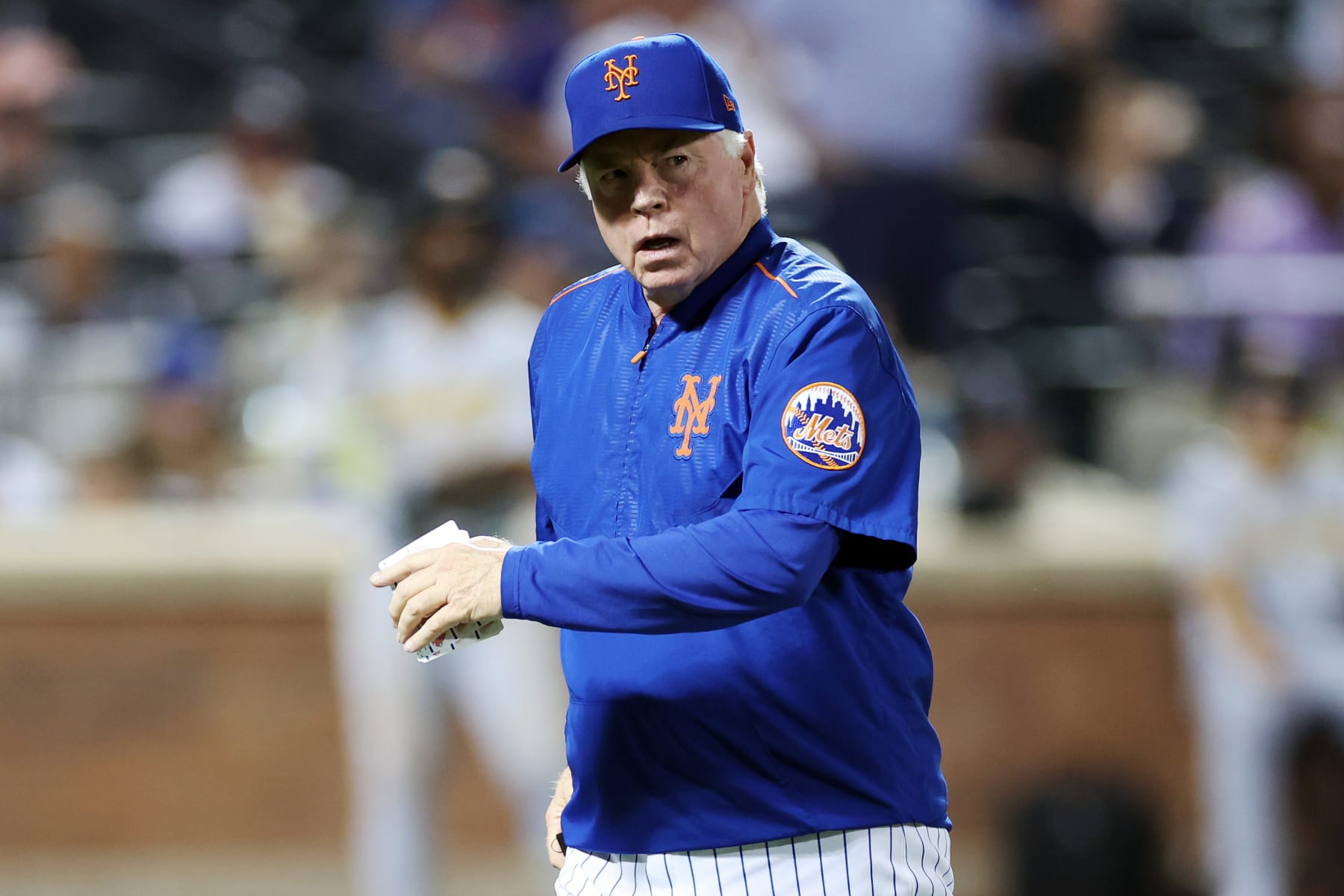 QUEENS, NEW YORK - AUGUST 15: Manager Buck Showalter #11 of the New York Mets walks to the dugout during the seventh inning against the Pittsburgh Pirates at Citi Field on August 15, 2023 in the Queens borough of New York City. (Photo by Sarah Stier/Getty Images)