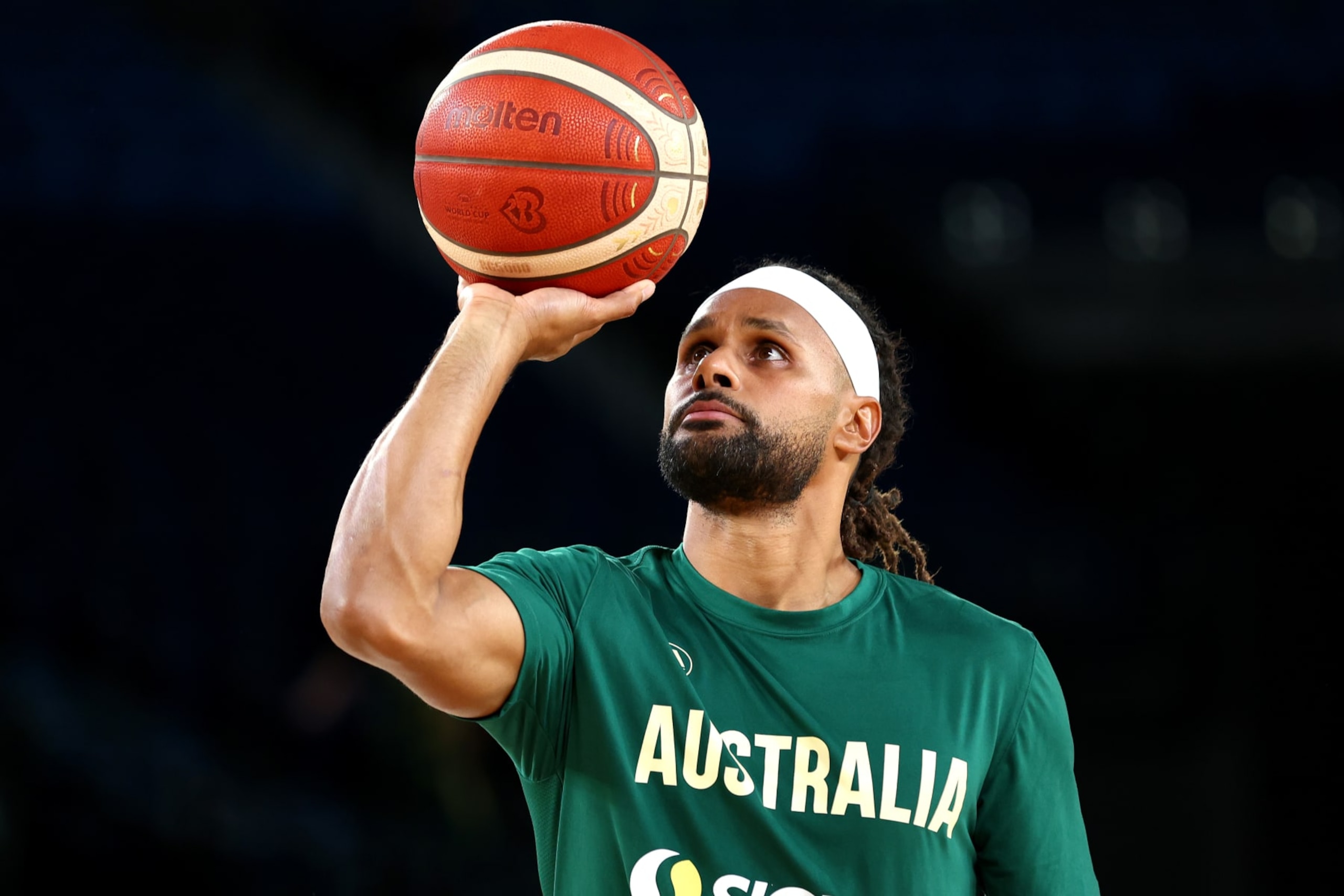 MELBOURNE, AUSTRALIA - AUGUST 16: Patty Mills of Australia warms up ahead of the match between the Australia Boomers and Brazil at Rod Laver Arena on August 16, 2023 in Melbourne, Australia. (Photo by Graham Denholm/Getty Images)