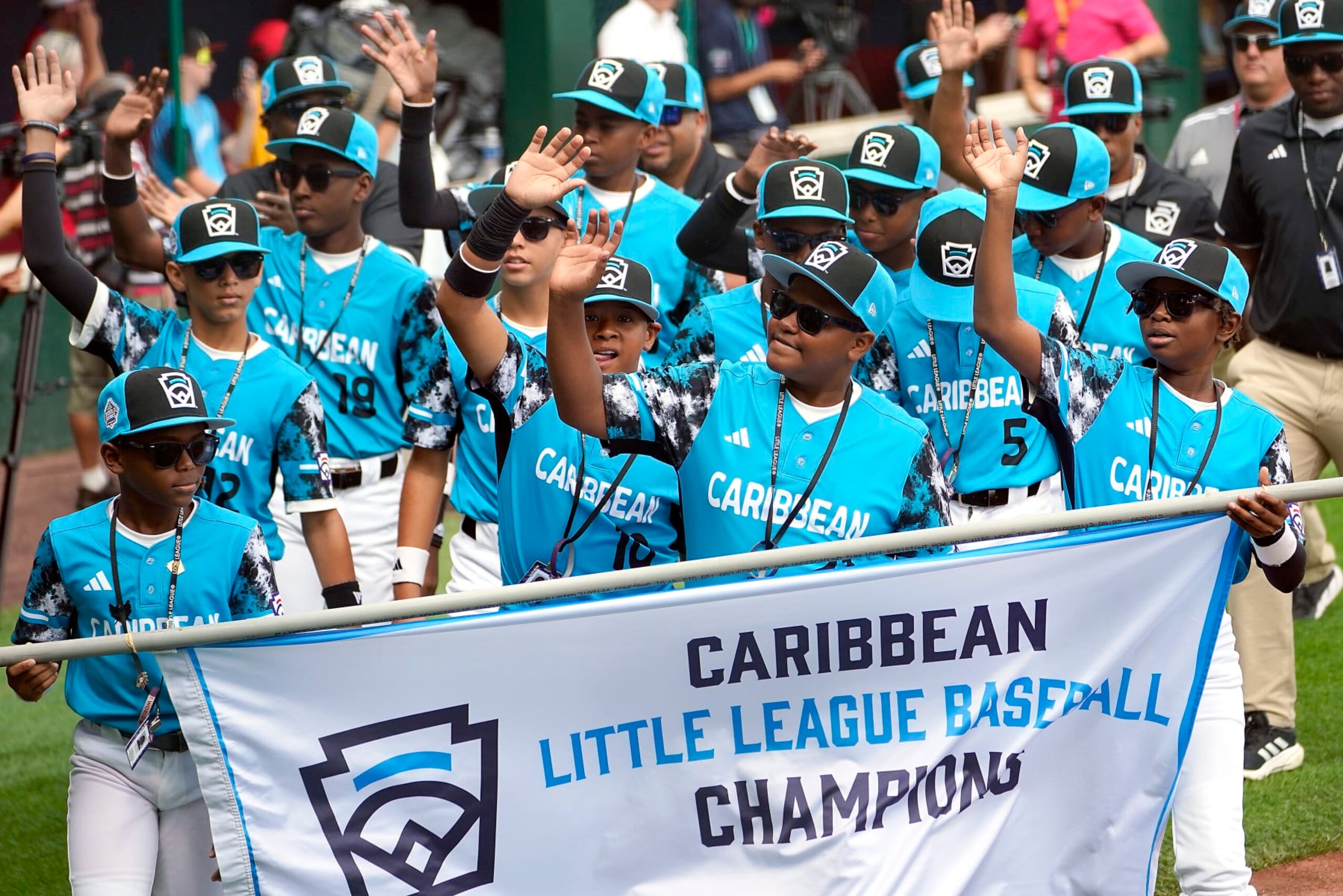 The Caribbean Region champion Little League team from Willemstad, Curacao, participates in the opening ceremony of the 2023 Little League World Series tournament in South Williamsport, Pa., Wednesday, Aug. 16, 2023. (AP Photo/Tom E. Puskar)