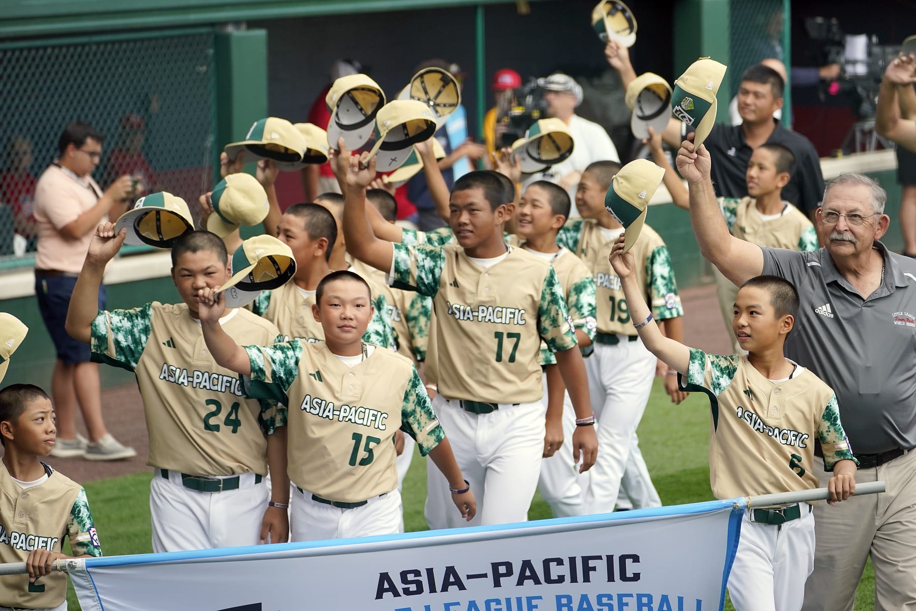 The Asia-Pacific Region champion Little League team from Taoyuan, Taiwan, participates in the opening ceremony of the 2023 Little League World Series tournament in South Williamsport, Pa., Wednesday, Aug. 16, 2023. (AP Photo/Tom E. Puskar)