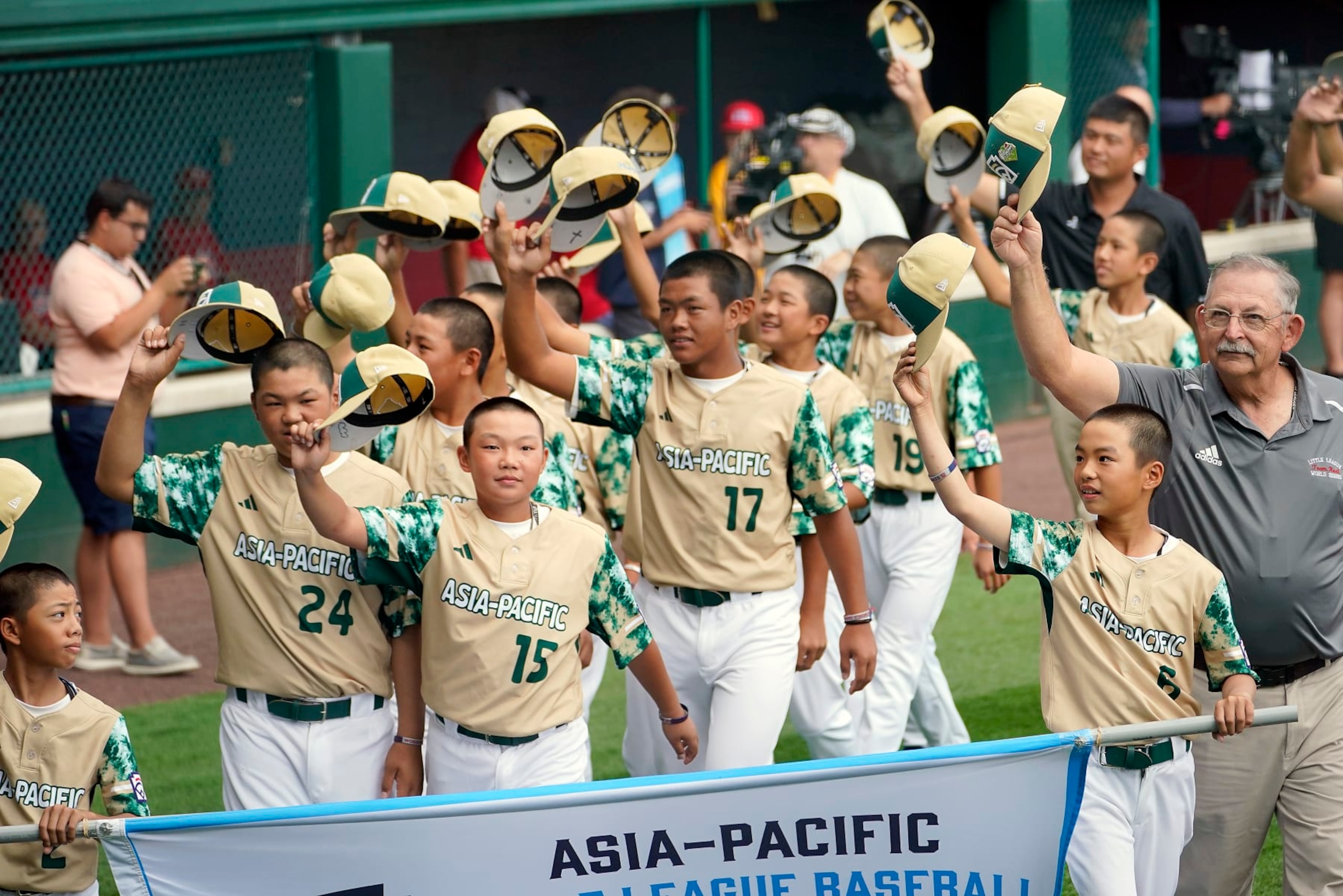 The Asia-Pacific Region champion Little League team from Taoyuan, Taiwan, participates in the opening ceremony of the 2023 Little League World Series tournament in South Williamsport, Pa., Wednesday, Aug. 16, 2023. (AP Photo/Tom E. Puskar)