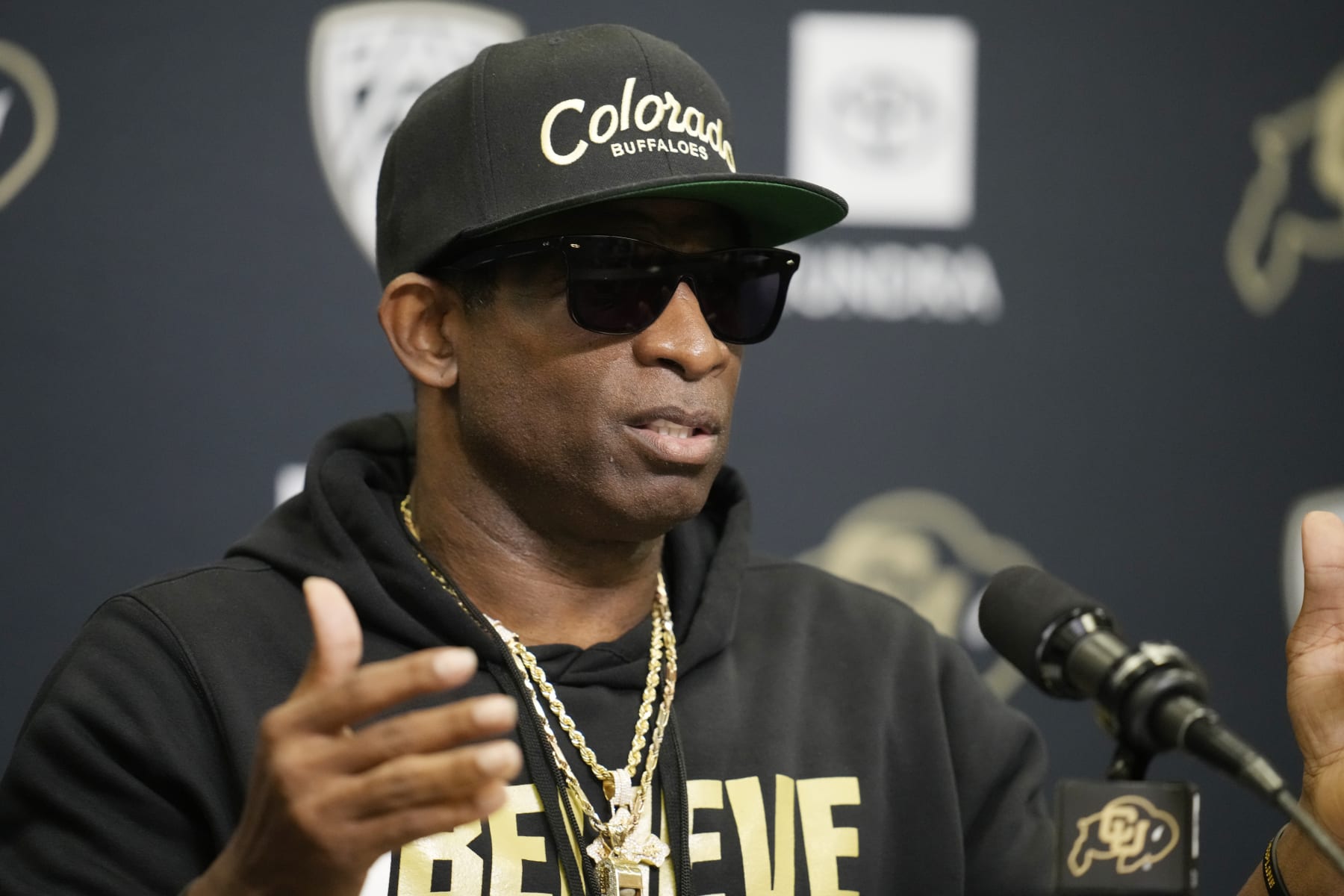 Colorado head coach Deion Sanders responds to questions during a news conference after the team's NCAA college football practice at the university Friday, Aug. 4, 2023, in Boulder, Colo. (AP Photo/David Zalubowski)