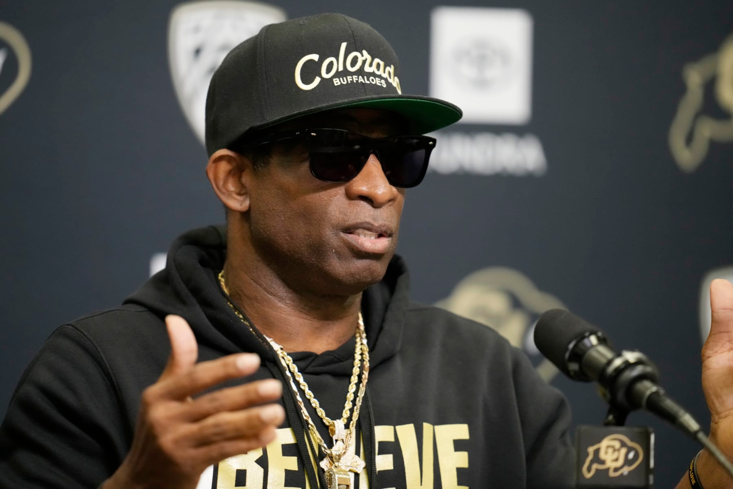 Colorado head coach Deion Sanders responds to questions during a news conference after the team's NCAA college football practice at the university Friday, Aug. 4, 2023, in Boulder, Colo. (AP Photo/David Zalubowski)