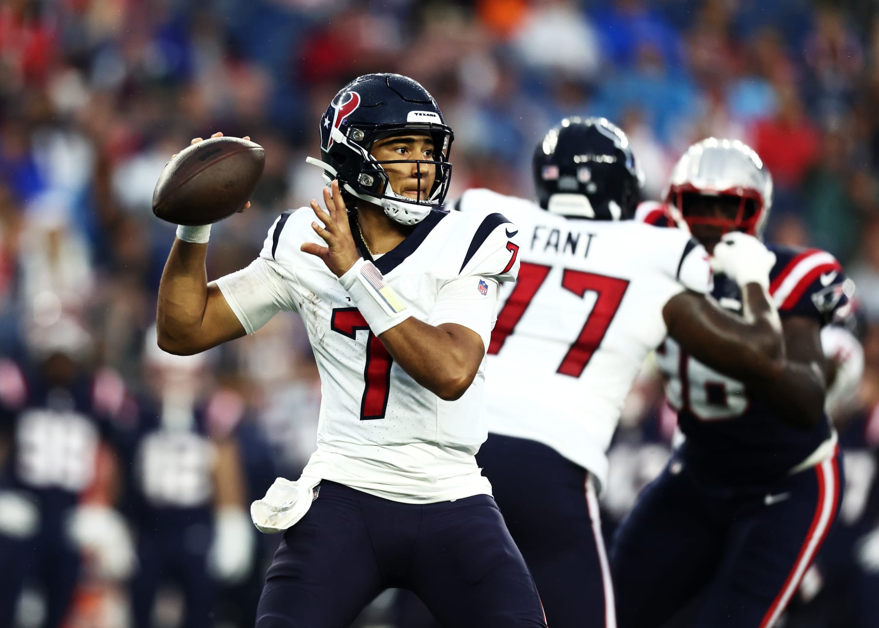 FOXBOROUGH, MASSACHUSETTS - AUGUST 10: Quarterback C.J. Stroud #7 of the Houston Texans looks to pass during the first quarter during the preseason game against the New England Patriots at Gillette Stadium on August 10, 2023 in Foxborough, Massachusetts. (Photo by Omar Rawlings/Getty Images)