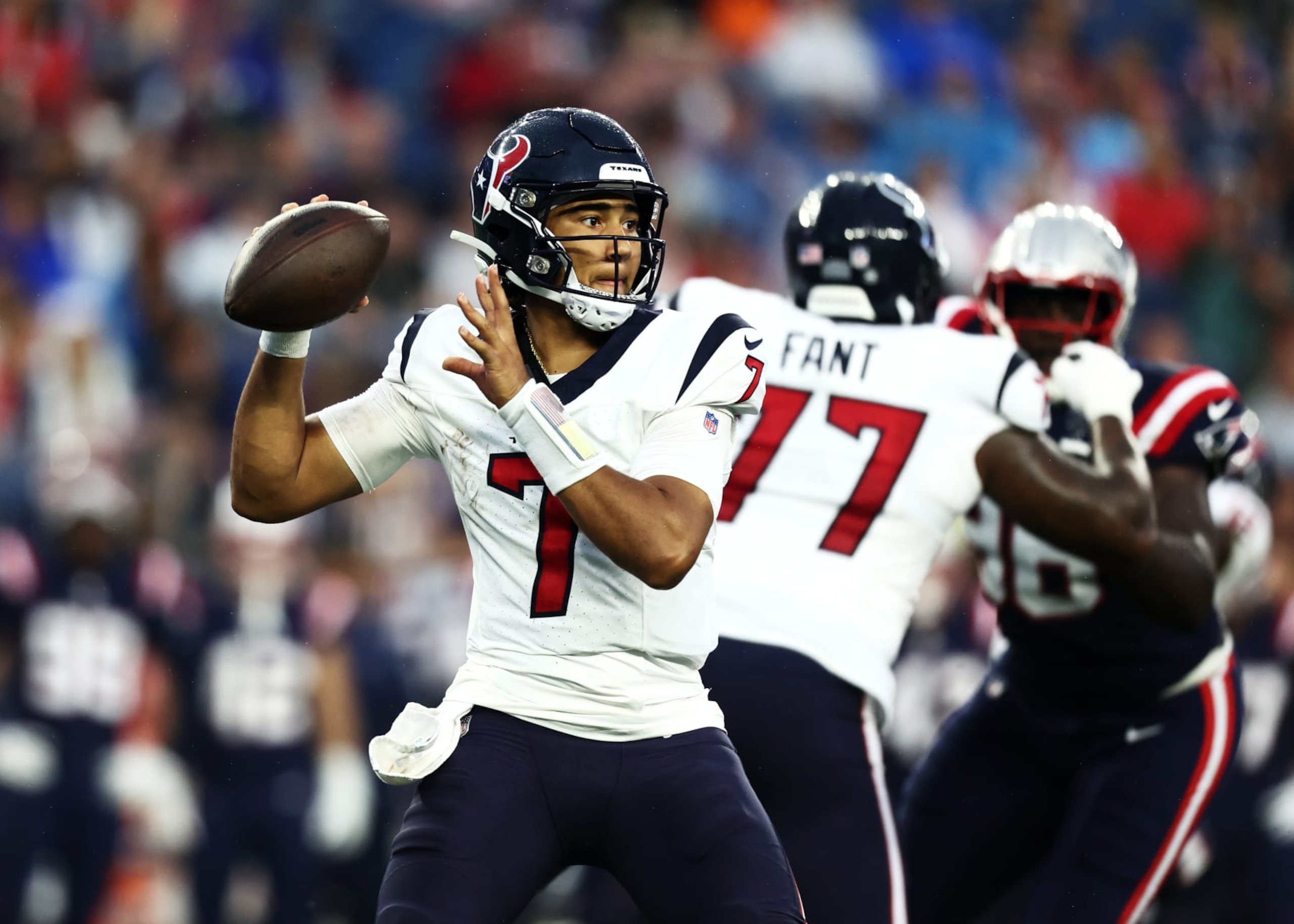FOXBOROUGH, MASSACHUSETTS - AUGUST 10: Quarterback C.J. Stroud #7 of the Houston Texans looks to pass during the first quarter during the preseason game against the New England Patriots at Gillette Stadium on August 10, 2023 in Foxborough, Massachusetts. (Photo by Omar Rawlings/Getty Images)