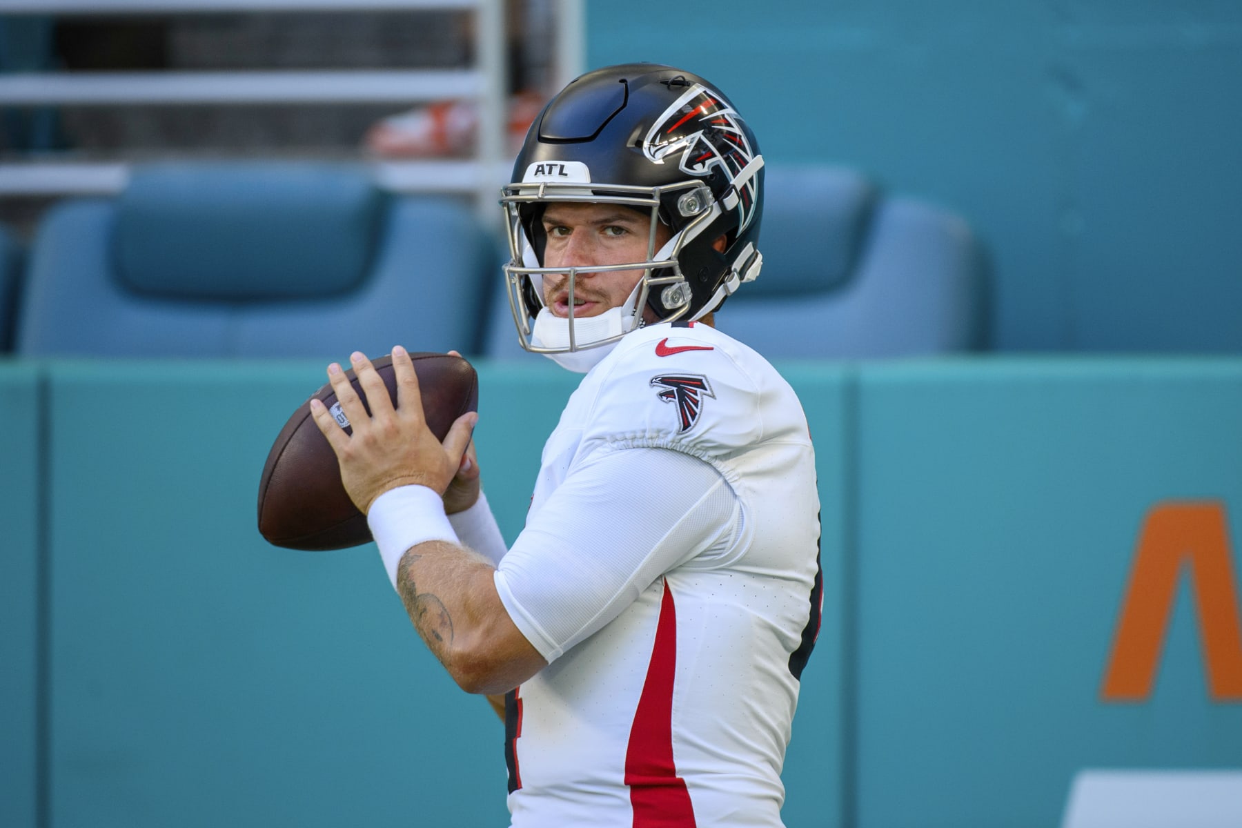 Atlanta Falcons quarterback Taylor Heinicke (4) throws the ball as he practices on the field before an NFL pre-season football game against the Miami Dolphins, Friday, Aug. 11, 2023, in Miami Gardens, Fla. (AP Photo/Doug Murray)