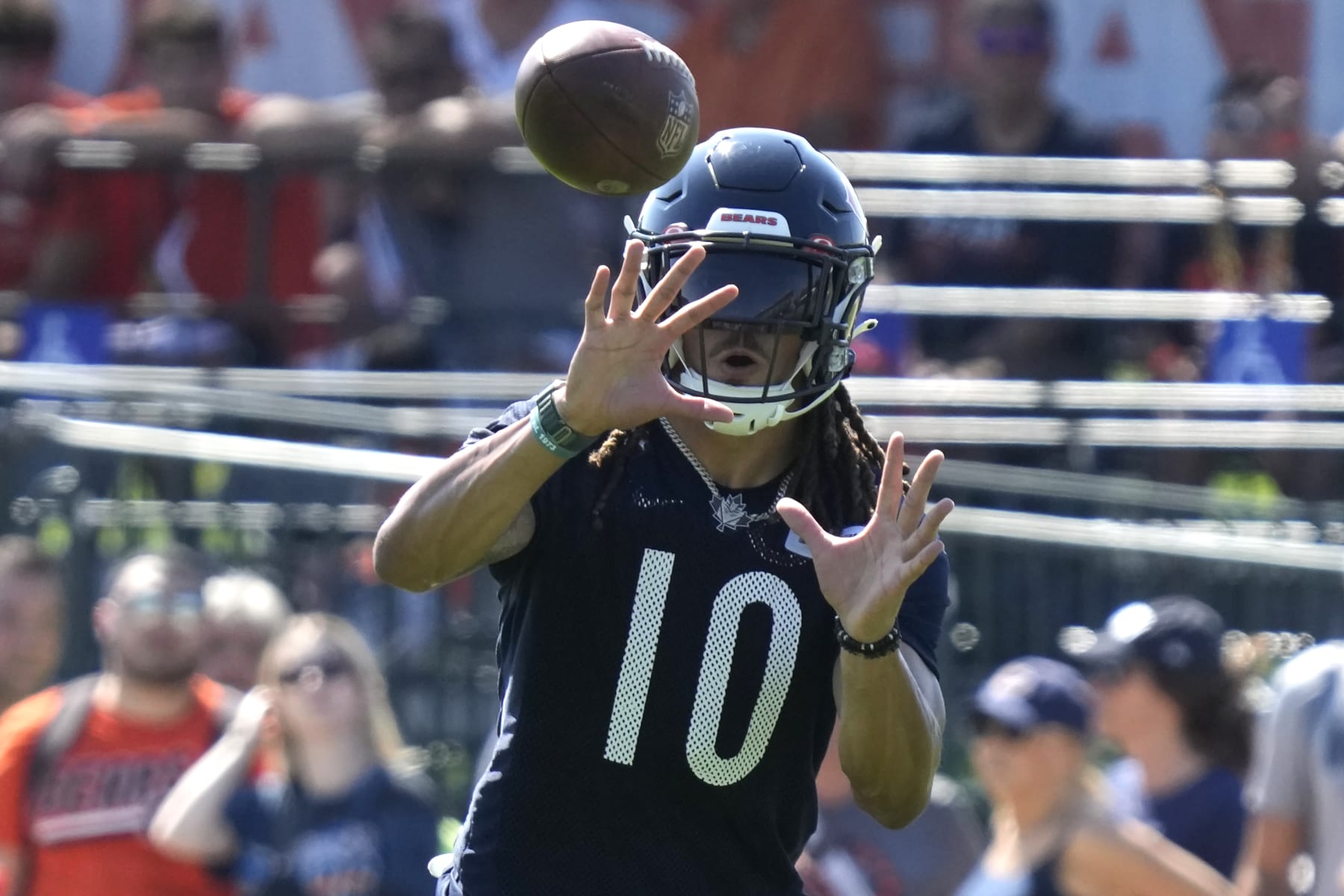 Chicago Bears wide receiver Chase Claypool catches a ball at the NFL football team's training camp in Lake Forest, Ill., Thursday, July 27, 2023. (AP Photo/Nam Y. Huh)