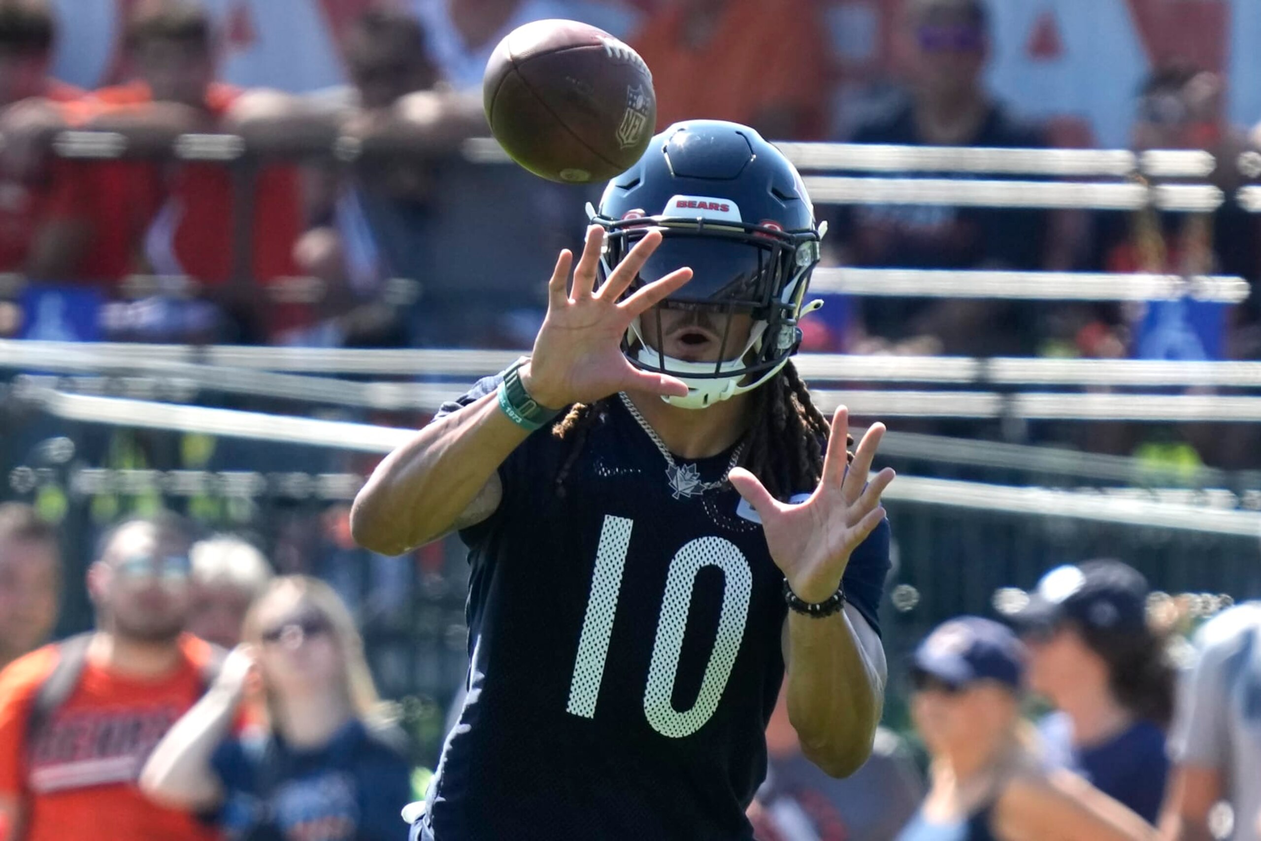 Chicago Bears wide receiver Chase Claypool catches a ball at the NFL football team's training camp in Lake Forest, Ill., Thursday, July 27, 2023. (AP Photo/Nam Y. Huh)