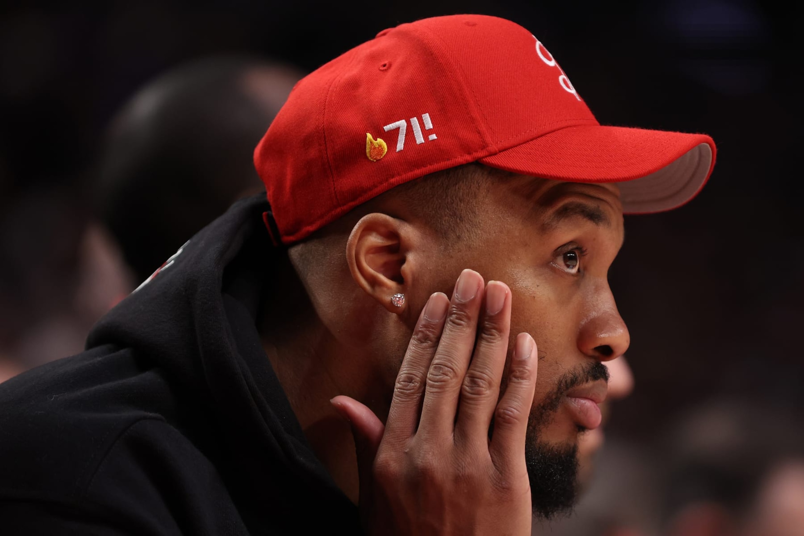 PORTLAND, OREGON - APRIL 09: Damian Lillard #0 of the Portland Trail Blazers looks on during the third quarter against the Golden State Warriors at Moda Center on April 09, 2023 in Portland, Oregon. NOTE TO USER: User expressly acknowledges and agrees that, by downloading and/or using this Photograph, user is consenting to the terms and conditions of the Getty Images License Agreement. (Photo by Steph Chambers/Getty Images)