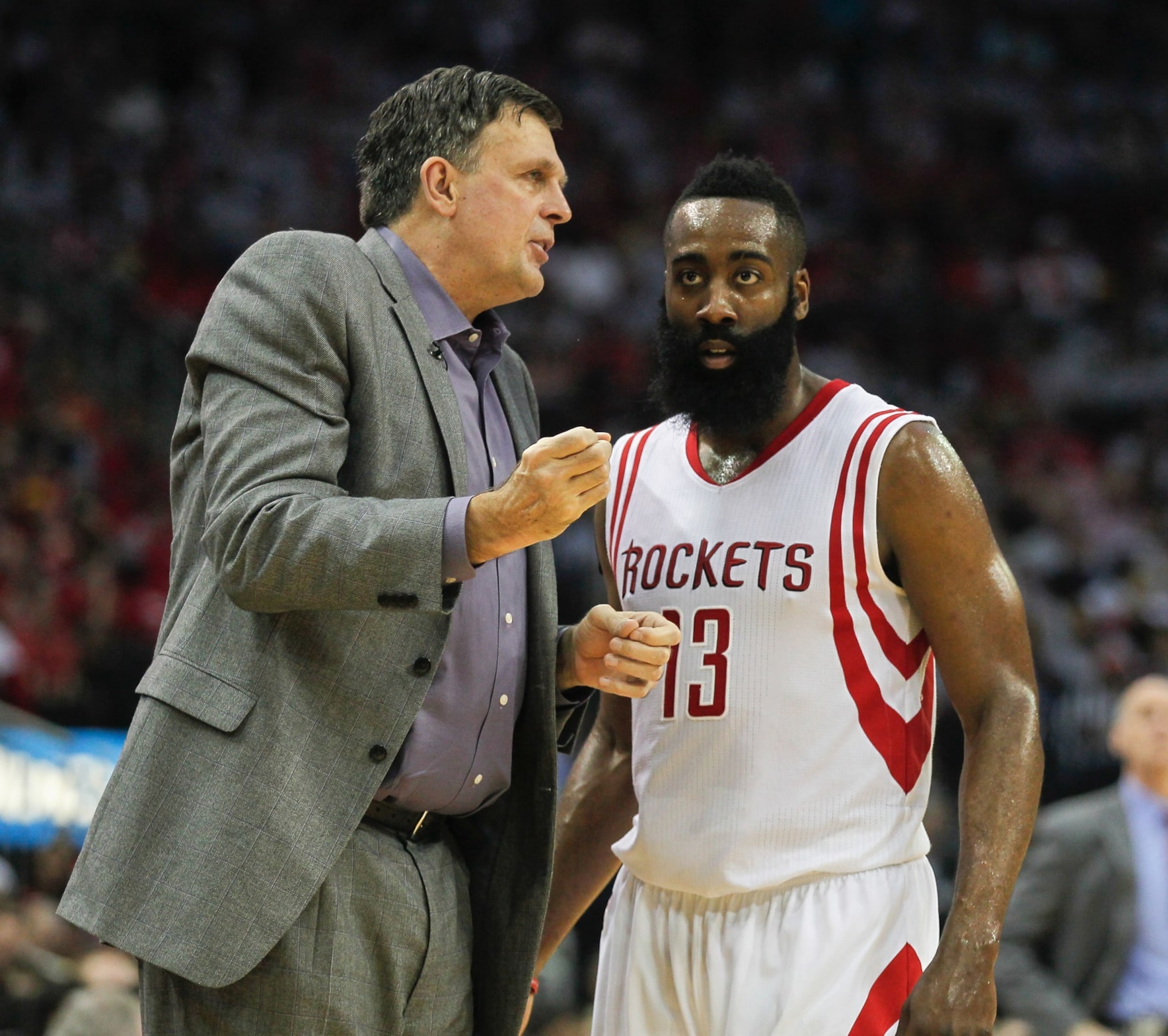 HOUSTON, TX - APRIL 21:  Head coach Kevin McHale of the Houston Rockets talks with James Harden #13 during Game Two of the Western Conference Quarterfinals of the 2015 NBA Playoffs at Toyota Center on April 21, 2015 in Houston, Texas. NOTE TO USER: User expressly acknowledges and agrees that, by downloading and/or using this photograph, user is consenting to the terms and conditions of the Getty Images License Agreement.  (Photo by Bob Levey/Getty Images)