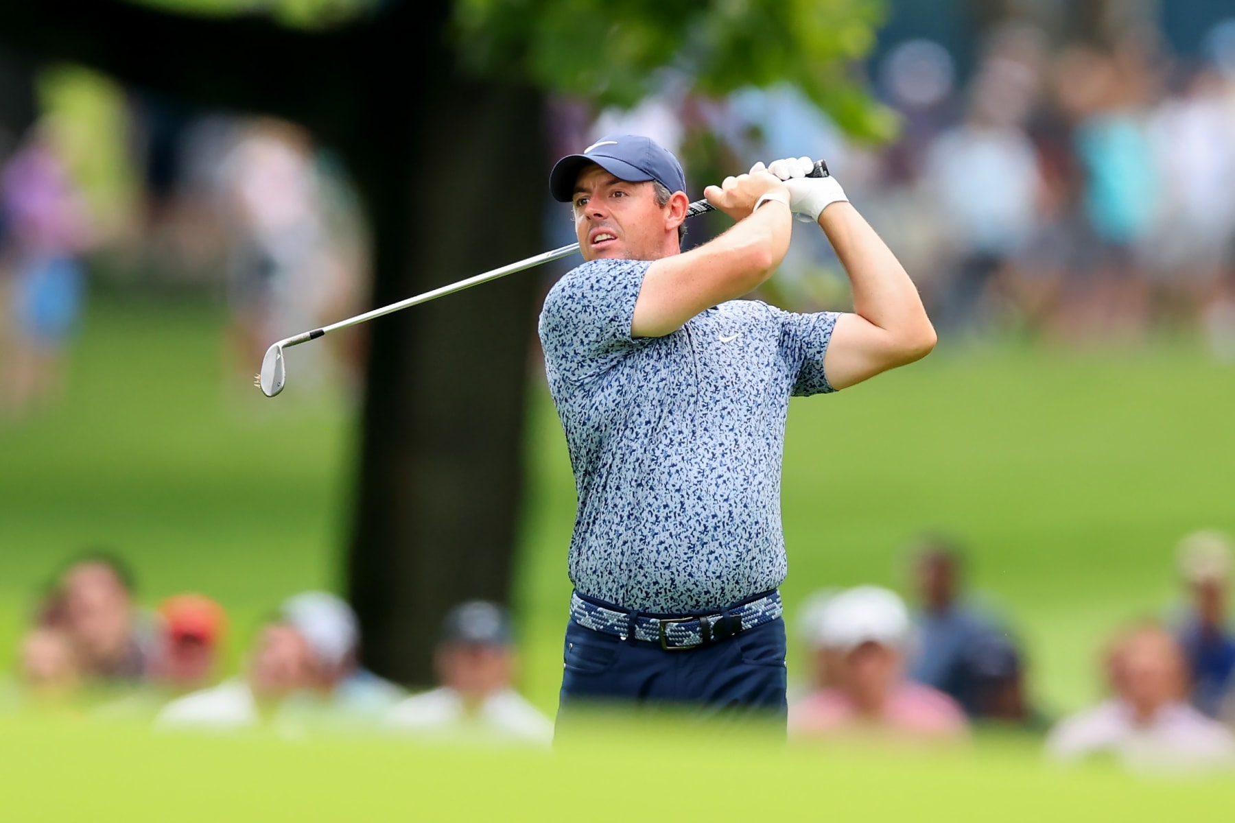 OLYMPIA FIELDS, ILLINOIS - AUGUST 17: Rory McIlroy of Northern Ireland plays a shot on the first hole during the first round of the BMW Championship at Olympia Fields Country Club on August 17, 2023 in Olympia Fields, Illinois. (Photo by Stacy Revere/Getty Images)