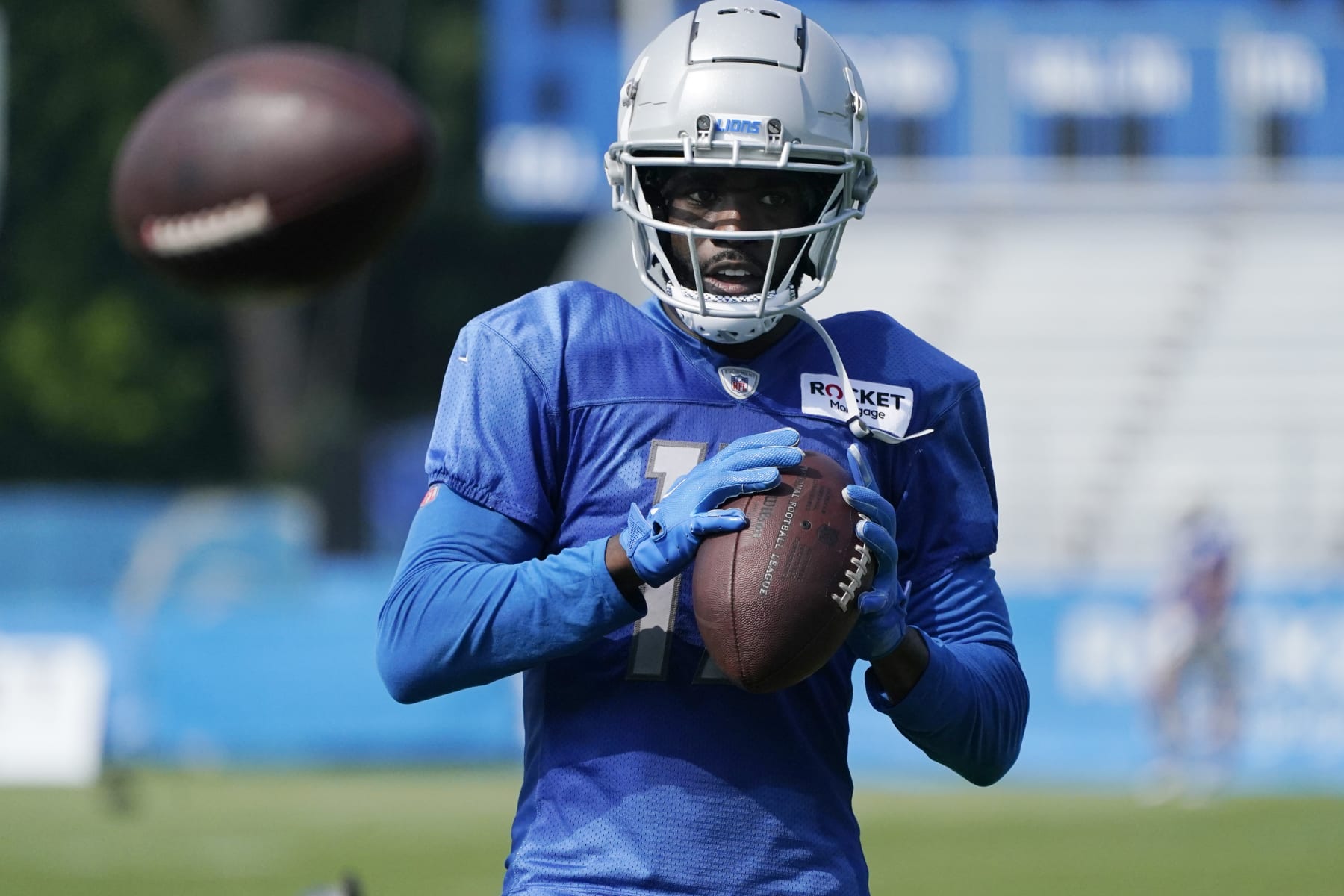 Detroit Lions receiver Denzel Mims works on a drill after an NFL football practice, Wednesday, July 26, 2023, in Allen Park, Mich. (AP Photo/Carlos Osorio)