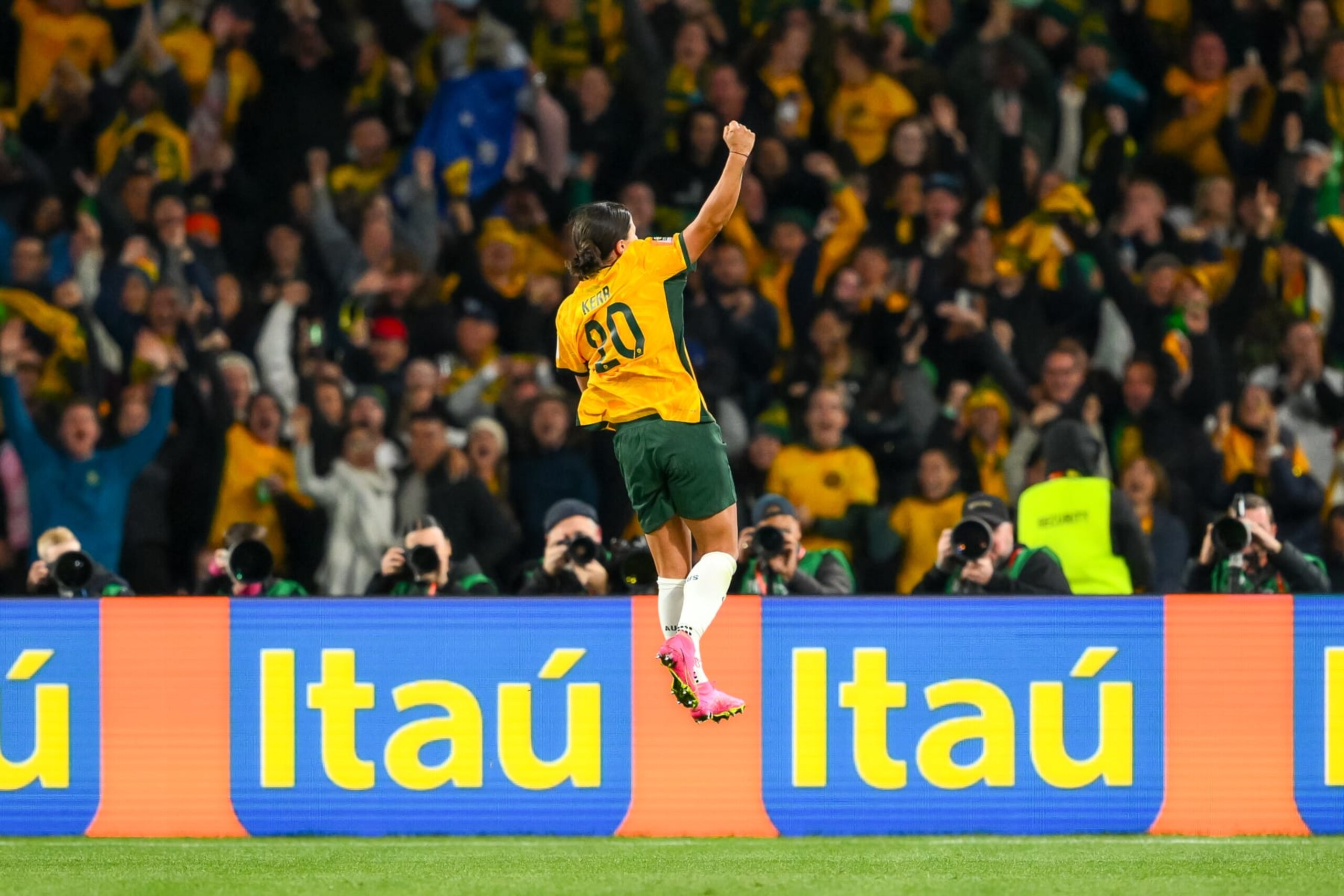 SYDNEY, AUSTRALIA - AUGUST 16: Sam Kerr of Australia celebrates after scoring her team's first goal during the FIFA Women's World Cup Australia & New Zealand 2023 Semi Final match between Australia and England at Stadium Australia on August 16, 2023 in Sydney, Australia. (Photo by Amy Halpin/ DeFodi Images via Getty Images)