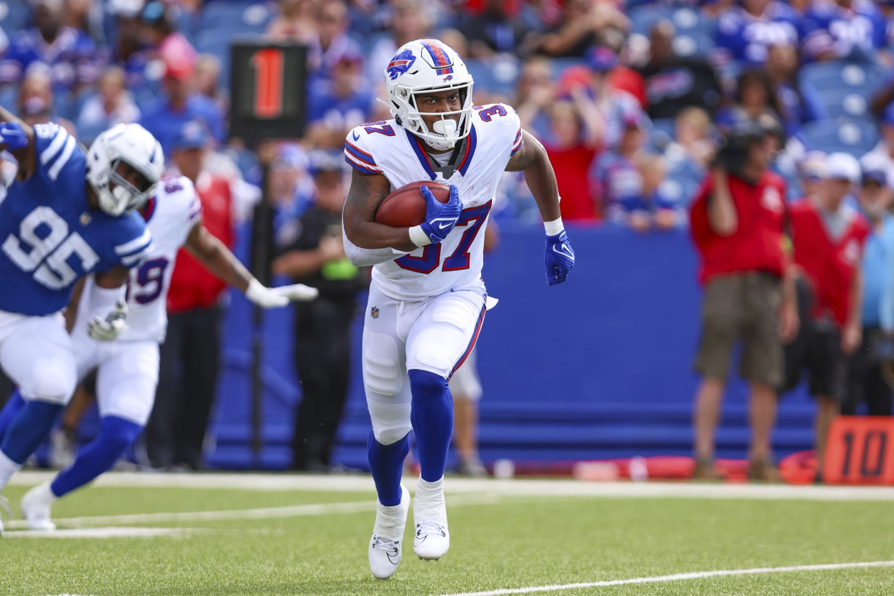 Buffalo Bills running back Darrynton Evans (37) runs the ball during an NFL pre-season football game against the Indianapolis Colts, Saturday, Aug. 12, 2023, in Orchard Park, N.Y. Buffalo defeated the Colts 23-19. (AP Photo/Gary McCullough)