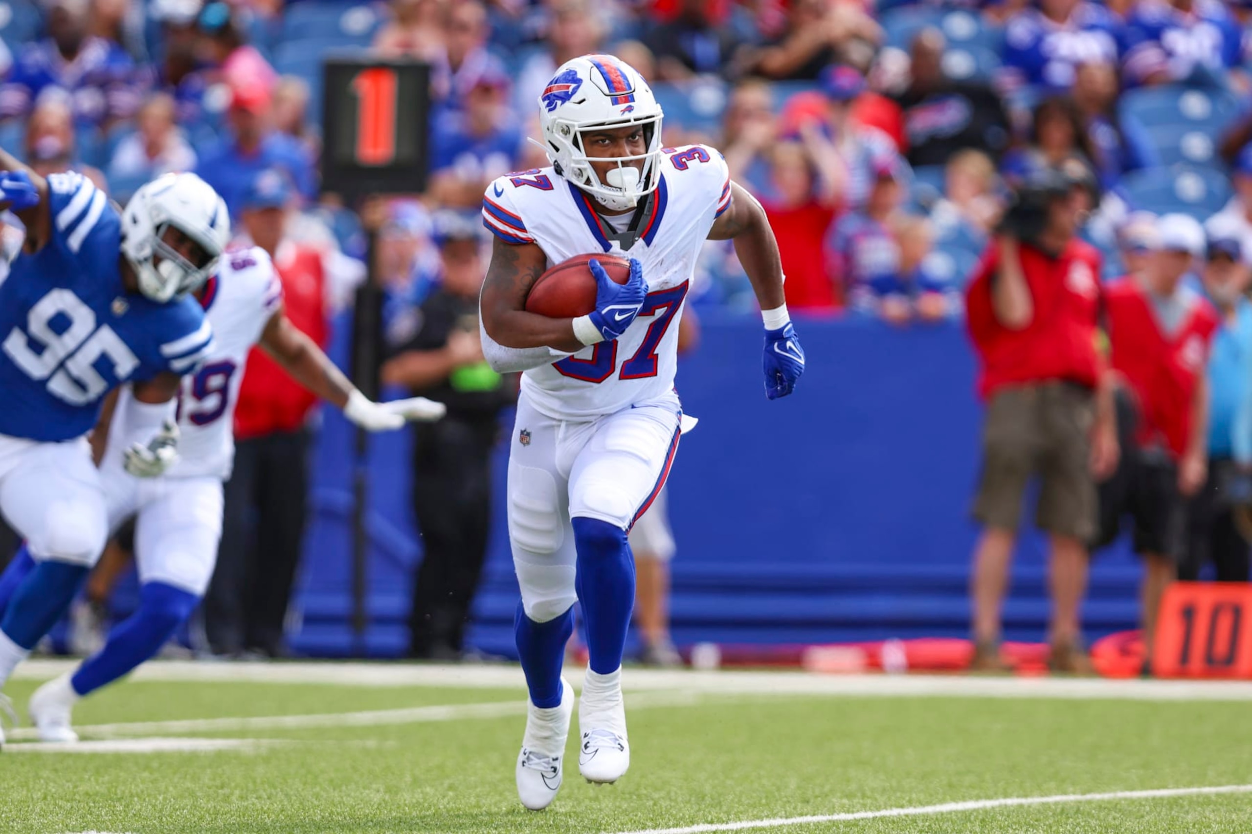 Buffalo Bills running back Darrynton Evans (37) runs the ball during an NFL pre-season football game against the Indianapolis Colts, Saturday, Aug. 12, 2023, in Orchard Park, N.Y. Buffalo defeated the Colts 23-19. (AP Photo/Gary McCullough)