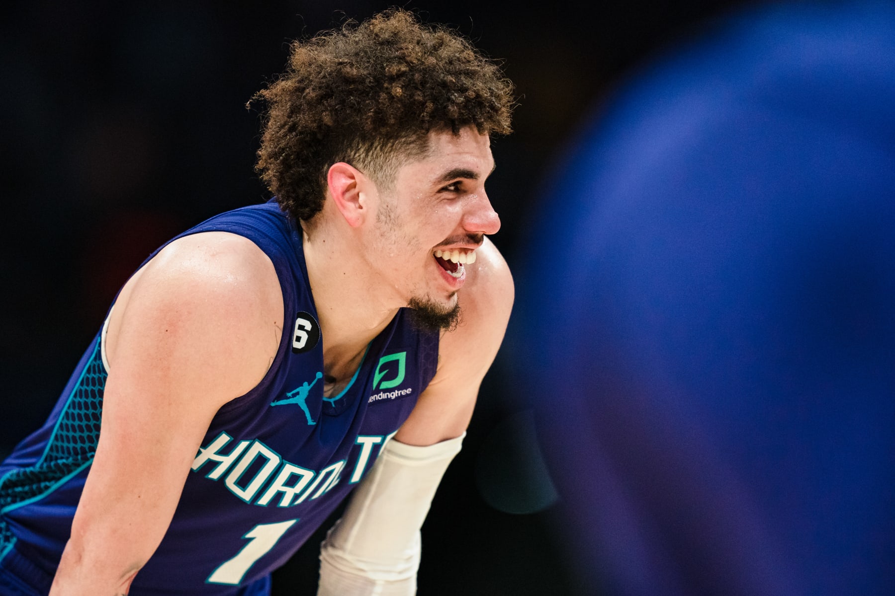 CHARLOTTE, NORTH CAROLINA - FEBRUARY 25: LaMelo Ball #1 of the Charlotte Hornets looks on during their game against the Miami Heat at Spectrum Center on February 25, 2023 in Charlotte, North Carolina. NOTE TO USER: User expressly acknowledges and agrees that, by downloading and or using this photograph, User is consenting to the terms and conditions of the Getty Images License Agreement. (Photo by Jacob Kupferman/Getty Images)