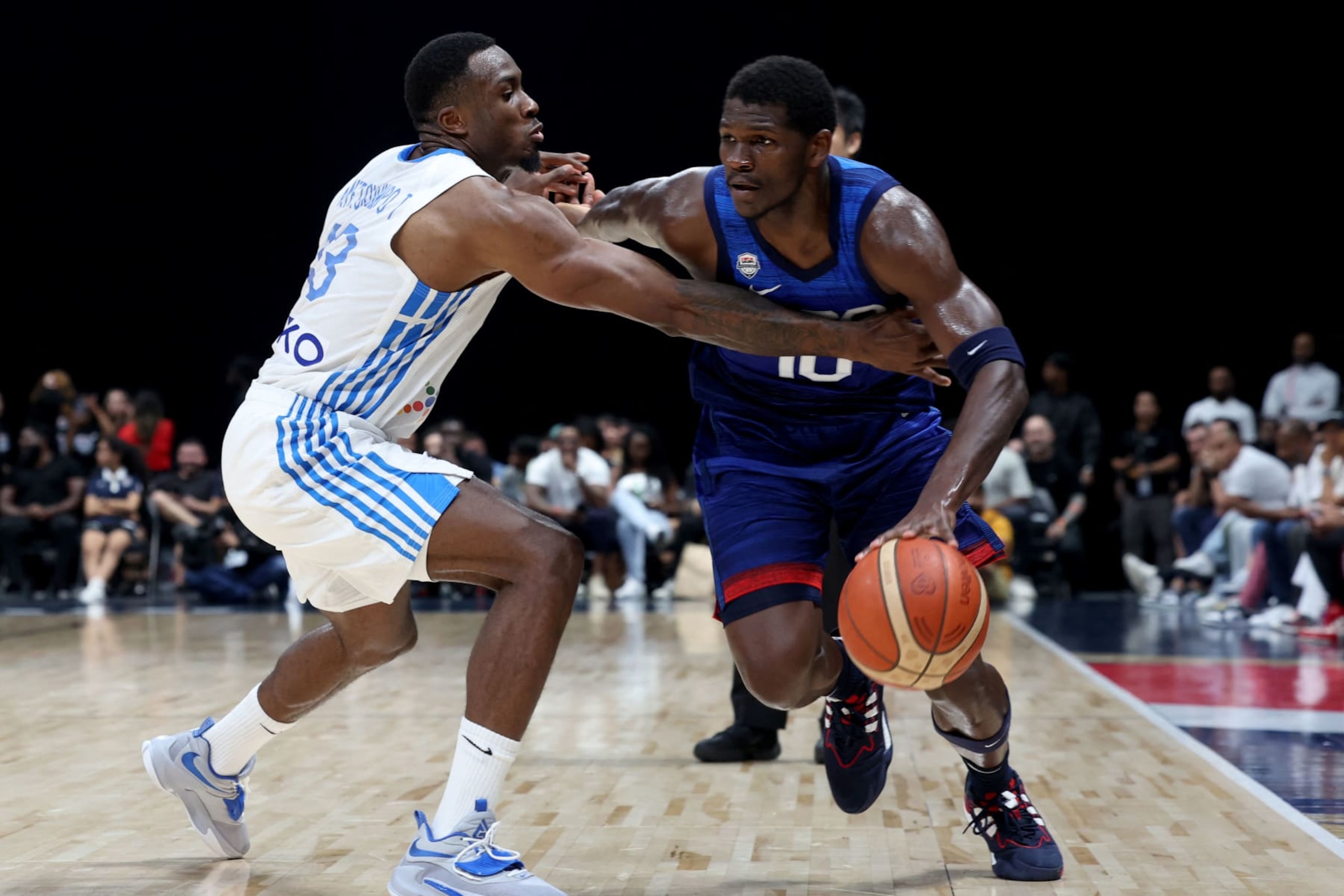 Greece's Thanasis Antetokounmpo (L) guards USA's Anthony Edwards during the Basketball Showcase friendly match between the USA and Greece at the Etihad Arena in Abu Dhabi on August 18, 2023. (Photo by Giuseppe CACACE / AFP) (Photo by GIUSEPPE CACACE/AFP via Getty Images)