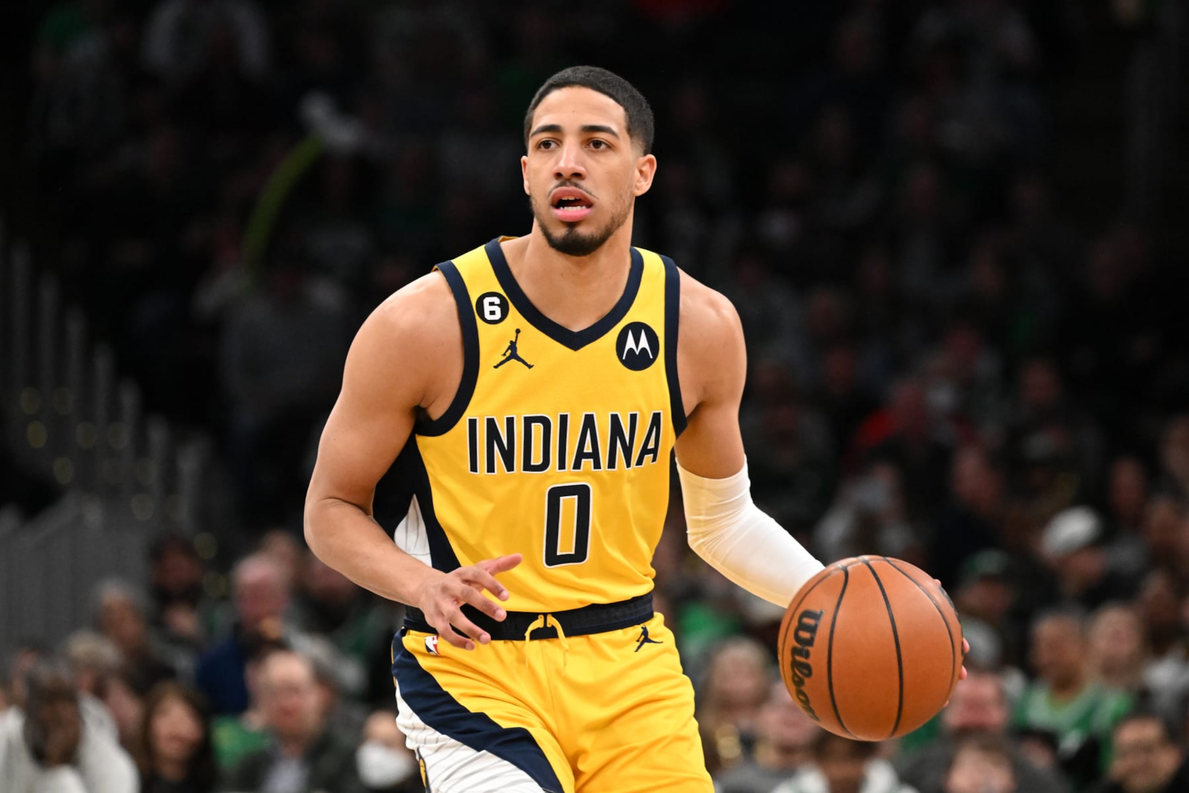 BOSTON, MASSACHUSETTS - MARCH 24: Tyrese Haliburton #0 of the Indiana Pacers dribbles the ball against the Boston Celtics during the first quarter at the TD Garden on March 24, 2023 in Boston, Massachusetts. NOTE TO USER: User expressly acknowledges and agrees that, by downloading and or using this photograph, User is consenting to the terms and conditions of the Getty Images License Agreement. (Photo by Brian Fluharty/Getty Images) BOSTON, MASSACHUSETTS - MARCH 24: Tyrese Haliburton #0 of the Indiana Pacers dribbles the ball against the Boston Celtics during the first quarter at the TD Garden on March 24, 2023 in Boston, Massachusetts. NOTE TO USER: User expressly acknowledges and agrees that, by downloading and or using this photograph, User is consenting to the terms and conditions of the Getty Images License Agreement. (Photo by Brian Fluharty/Getty Images)