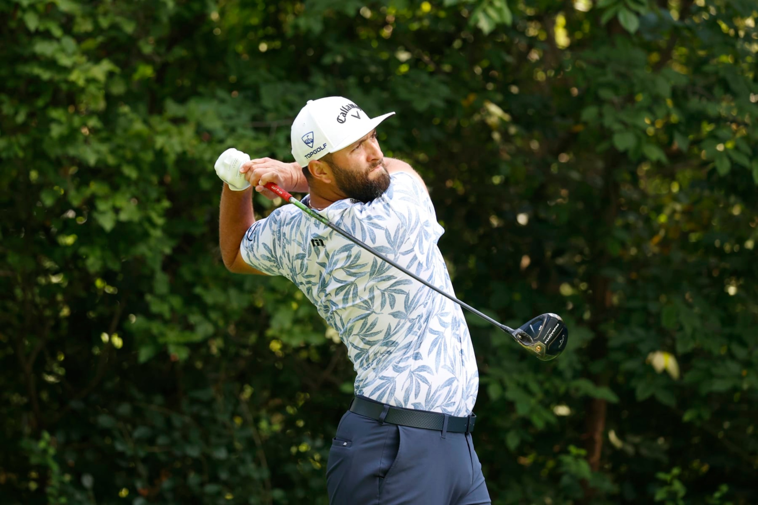 OLYMPIA FIELDS, IL - AUGUST 18: PGA golfer Jon Rahm hits his tee shot on the 4th hole during the second round of the BMW Championship Fed Ex Cup Playoffs on August 18th, 2023,  at Olympia Fields Country Club in Olympia Fields, Illinois. (Photo by Brian Spurlock/Icon Sportswire via Getty Images)
