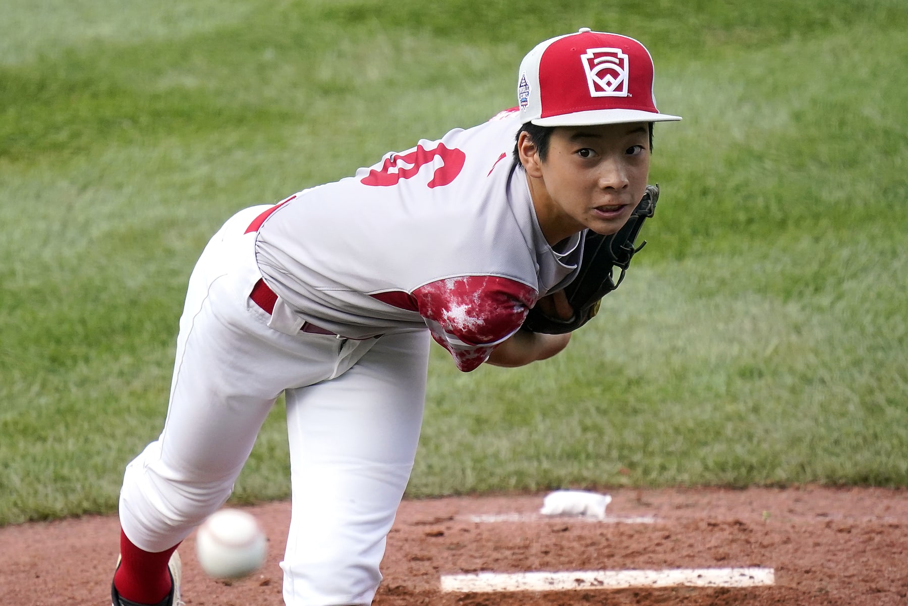 Japan starting pitcher Akito Masuda delivers against Mexico during the first inning of a baseball game at the Little League World Series tournament in South Williamsport, Pa., Friday, Aug. 18, 2023. (AP Photo/Tom E. Puskar)