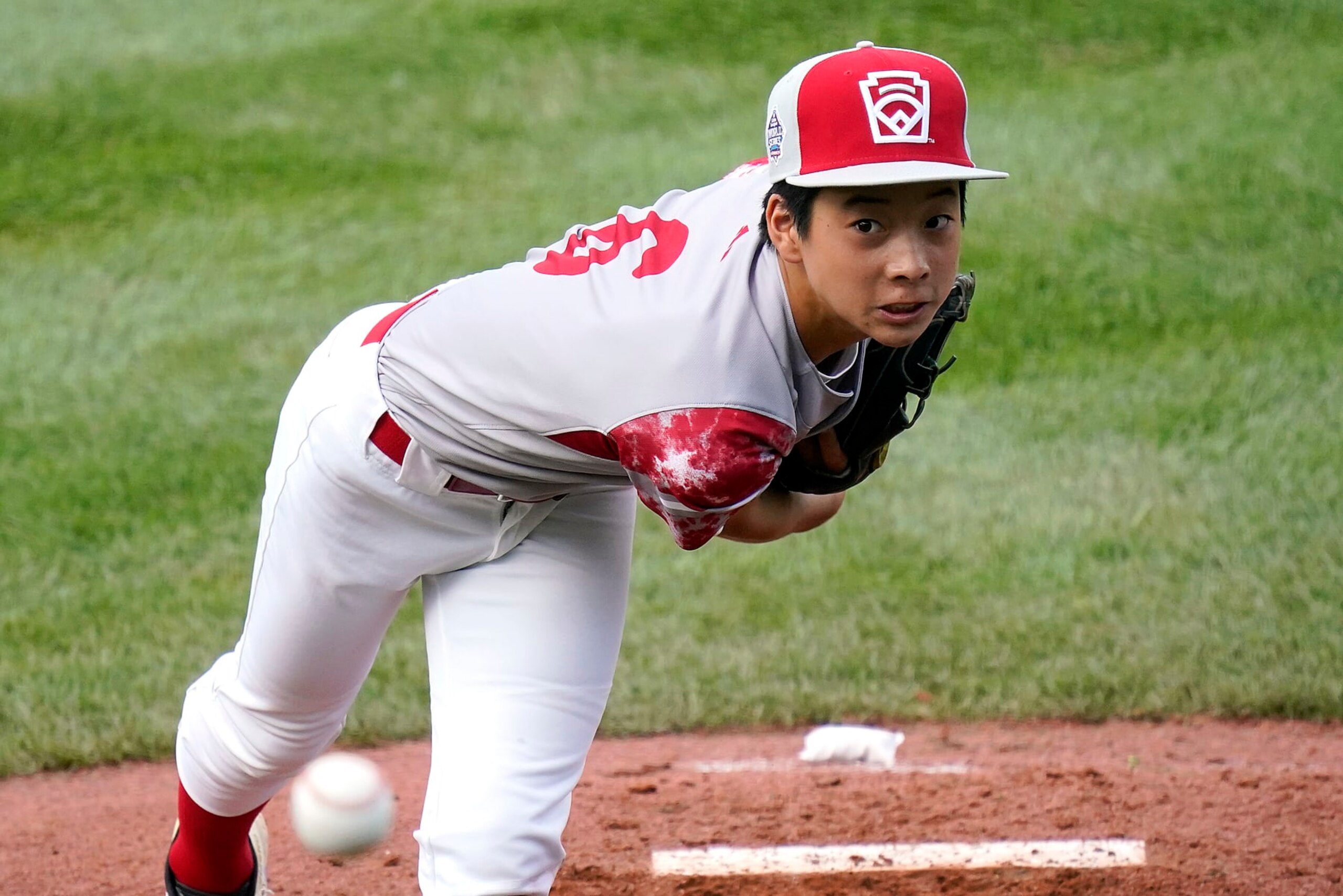 Japan starting pitcher Akito Masuda delivers against Mexico during the first inning of a baseball game at the Little League World Series tournament in South Williamsport, Pa., Friday, Aug. 18, 2023. (AP Photo/Tom E. Puskar)