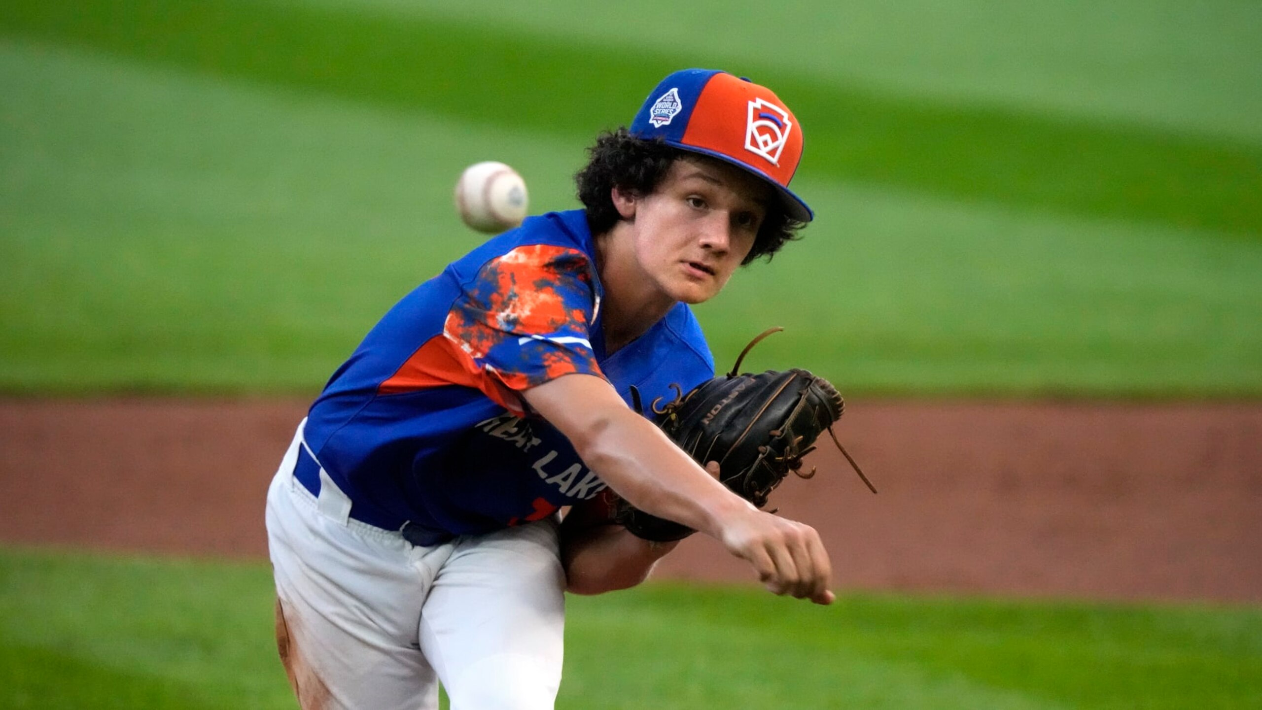 New Albany, Ohio's Kevin Klingerman delivers during the first inning of a baseball game against El Segundo, Calif. at the Little League World Series in South Williamsport, Pa., Thursday, Aug. 17, 2023. (AP Photo/Gene J. Puskar)