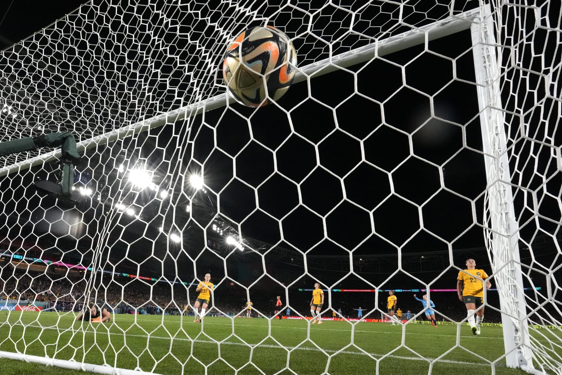 Australia's goalkeeper Mackenzie Arnold dives but fails to save the goal from England's Alessia Russo during the Women's World Cup semifinal soccer match between Australia and England at Stadium Australia in Sydney, Australia, Wednesday, Aug. 16, 2023. (AP Photo/Alessandra Tarantino)
