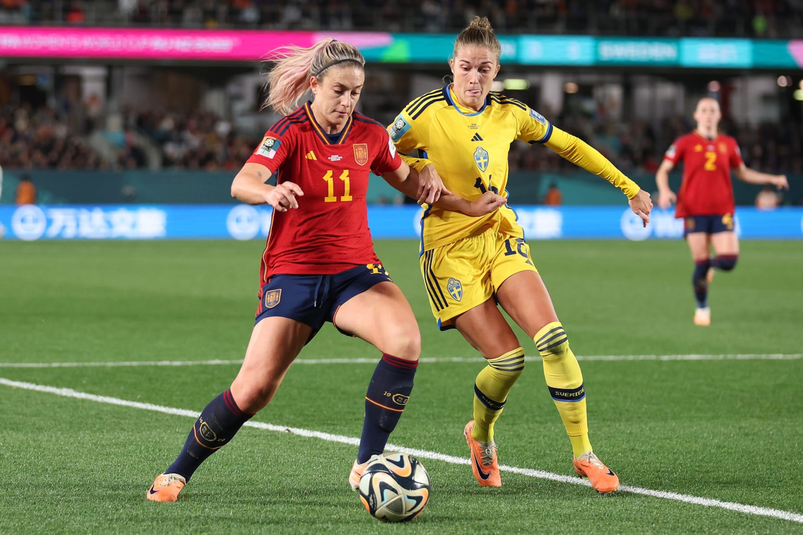 AUCKLAND, NEW ZEALAND - AUGUST 15: Alexia Putellas of Spain and Filippa Angeldal of Sweden compete for the ball during the FIFA Women's World Cup Australia & New Zealand 2023 Semi Final match between Spain and Sweden at Eden Park on August 15, 2023 in Auckland, New Zealand. (Photo by Catherine Ivill/Getty Images)