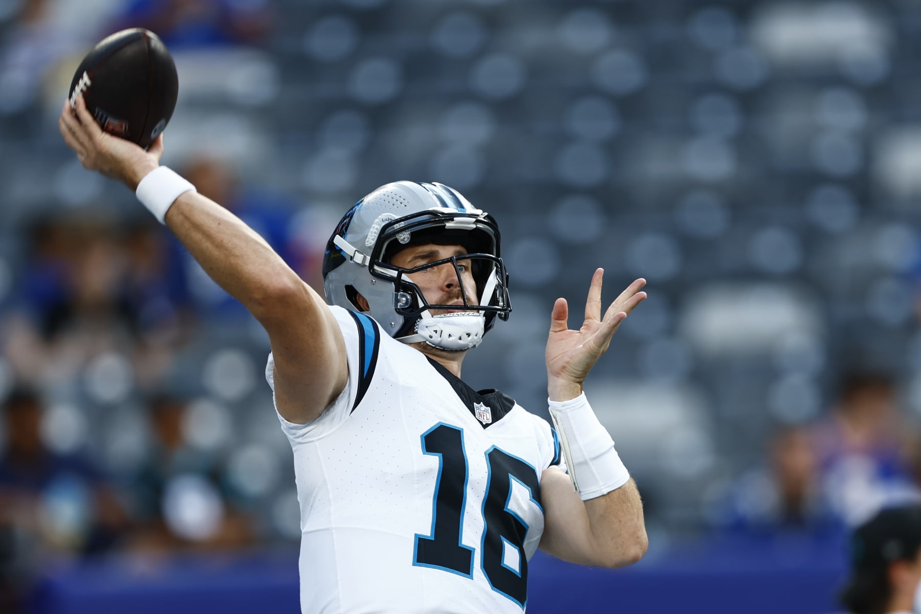 EAST RUTHERFORD, NEW JERSEY - AUGUST 18: Jake Luton #16 of the Carolina Panthers warms up before a pre-season football game against the New York Giants at MetLife Stadium on August 18, 2023 in East Rutherford, New Jersey. (Photo by Rich Schultz/Getty Images)