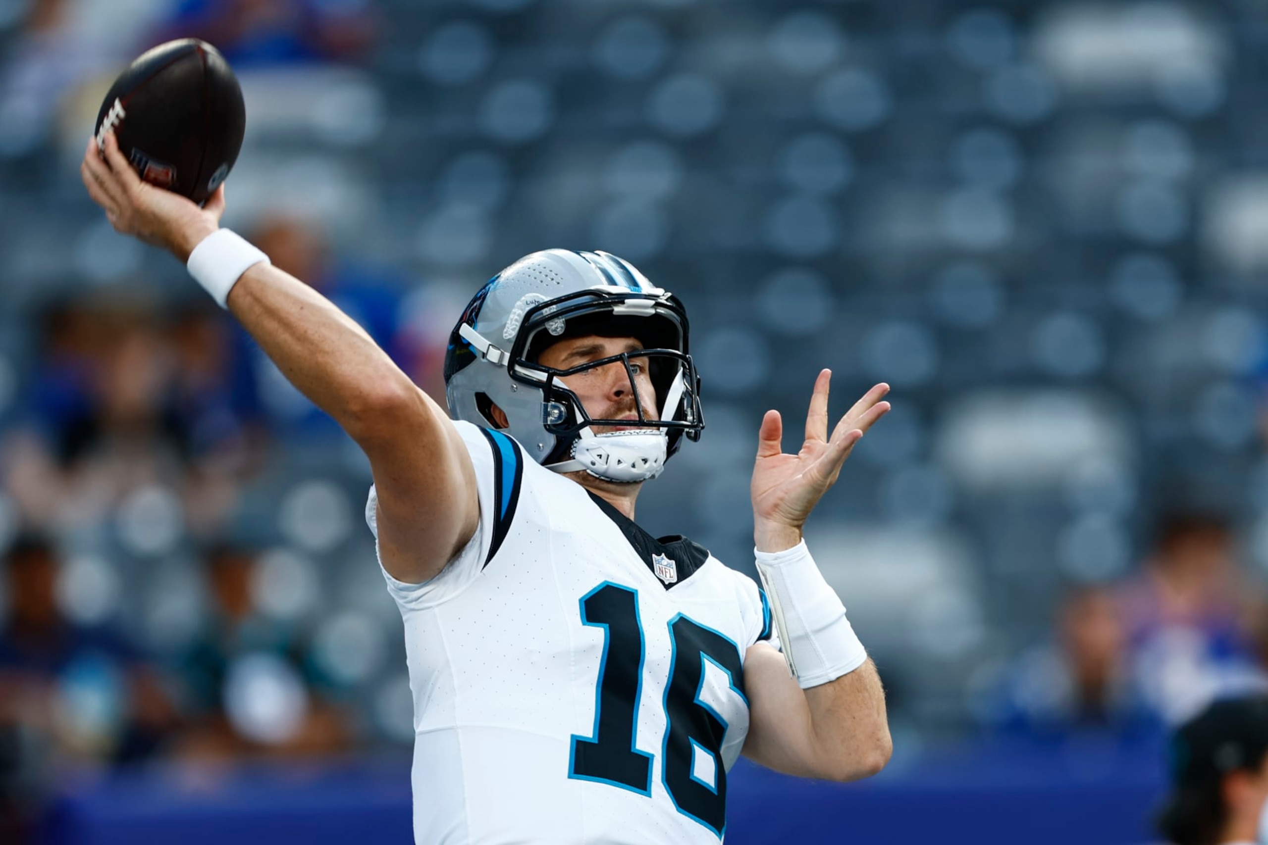 EAST RUTHERFORD, NEW JERSEY - AUGUST 18: Jake Luton #16 of the Carolina Panthers warms up before a pre-season football game against the New York Giants at MetLife Stadium on August 18, 2023 in East Rutherford, New Jersey. (Photo by Rich Schultz/Getty Images)