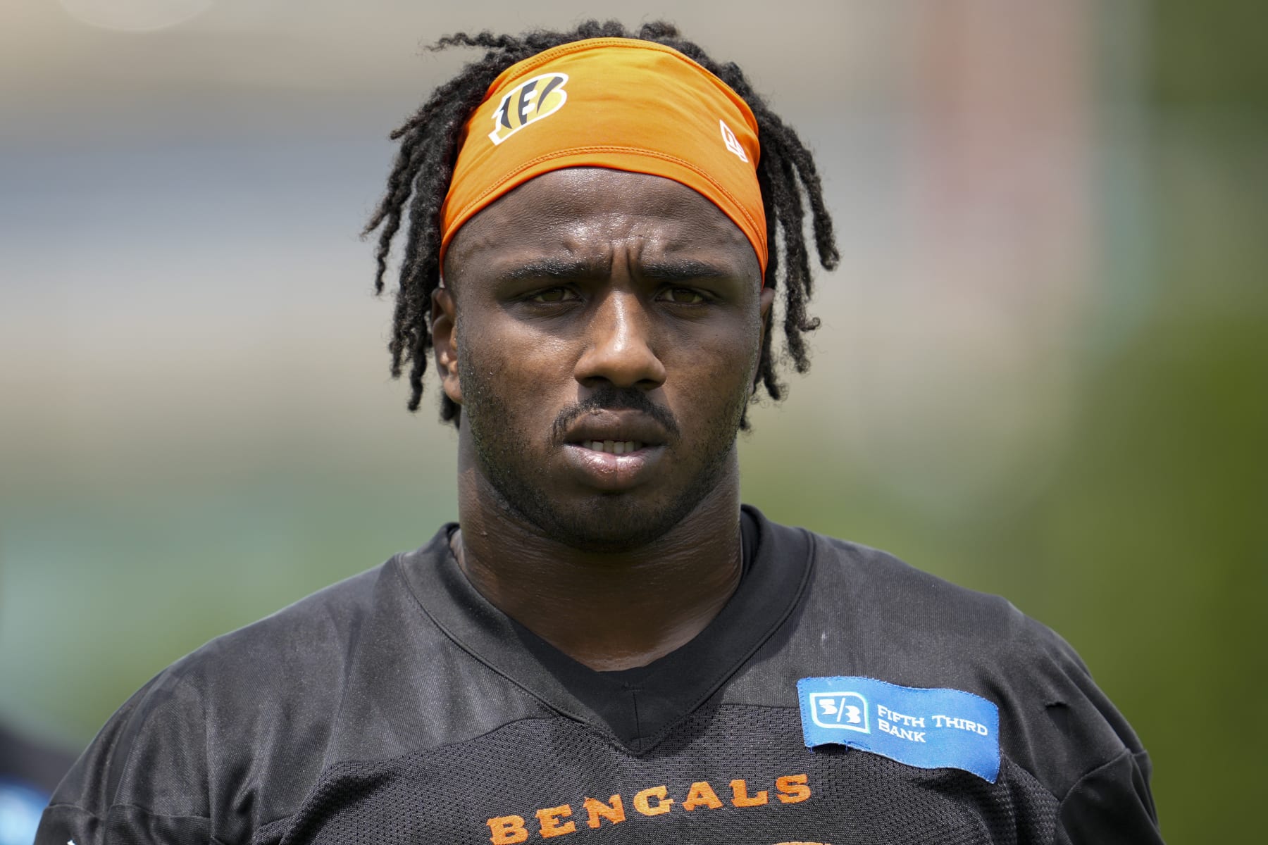 Cincinnati Bengals defensive end Tarell Basham (52) prepares to perform a drill during the NFL football team's training camp, Thursday, July 27, 2023, in Cincinnati. (AP Photo/Jeff Dean)