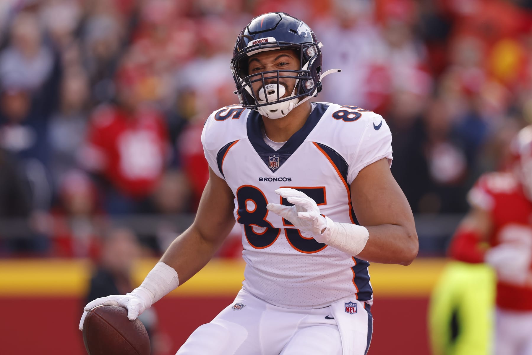 KANSAS CITY, MISSOURI - JANUARY 01: Albert Okwuegbunam #85 of the Denver Broncos celebrates a touchdown during the third quarter in the game against the Kansas City Chiefs at Arrowhead Stadium on January 01, 2023 in Kansas City, Missouri. (Photo by David Eulitt/Getty Images)
