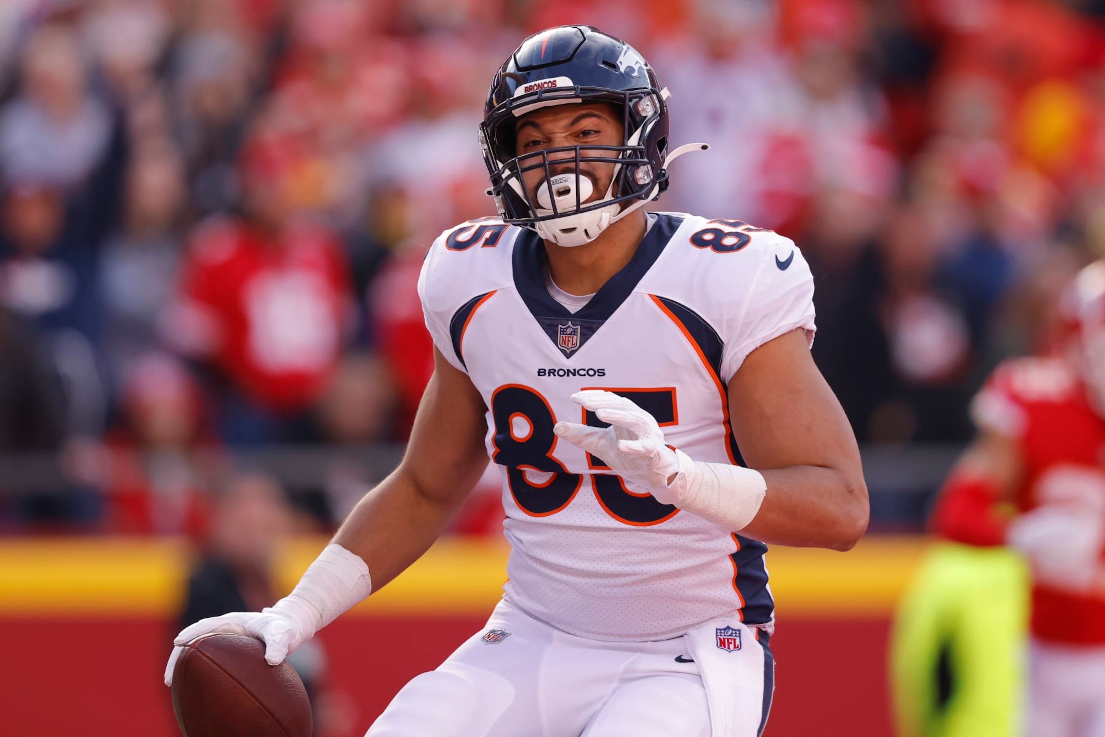 KANSAS CITY, MISSOURI - JANUARY 01: Albert Okwuegbunam #85 of the Denver Broncos celebrates a touchdown during the third quarter in the game against the Kansas City Chiefs at Arrowhead Stadium on January 01, 2023 in Kansas City, Missouri. (Photo by David Eulitt/Getty Images) KANSAS CITY, MISSOURI - JANUARY 01: Albert Okwuegbunam #85 of the Denver Broncos celebrates a touchdown during the third quarter in the game against the Kansas City Chiefs at Arrowhead Stadium on January 01, 2023 in Kansas City, Missouri. (Photo by David Eulitt/Getty Images)