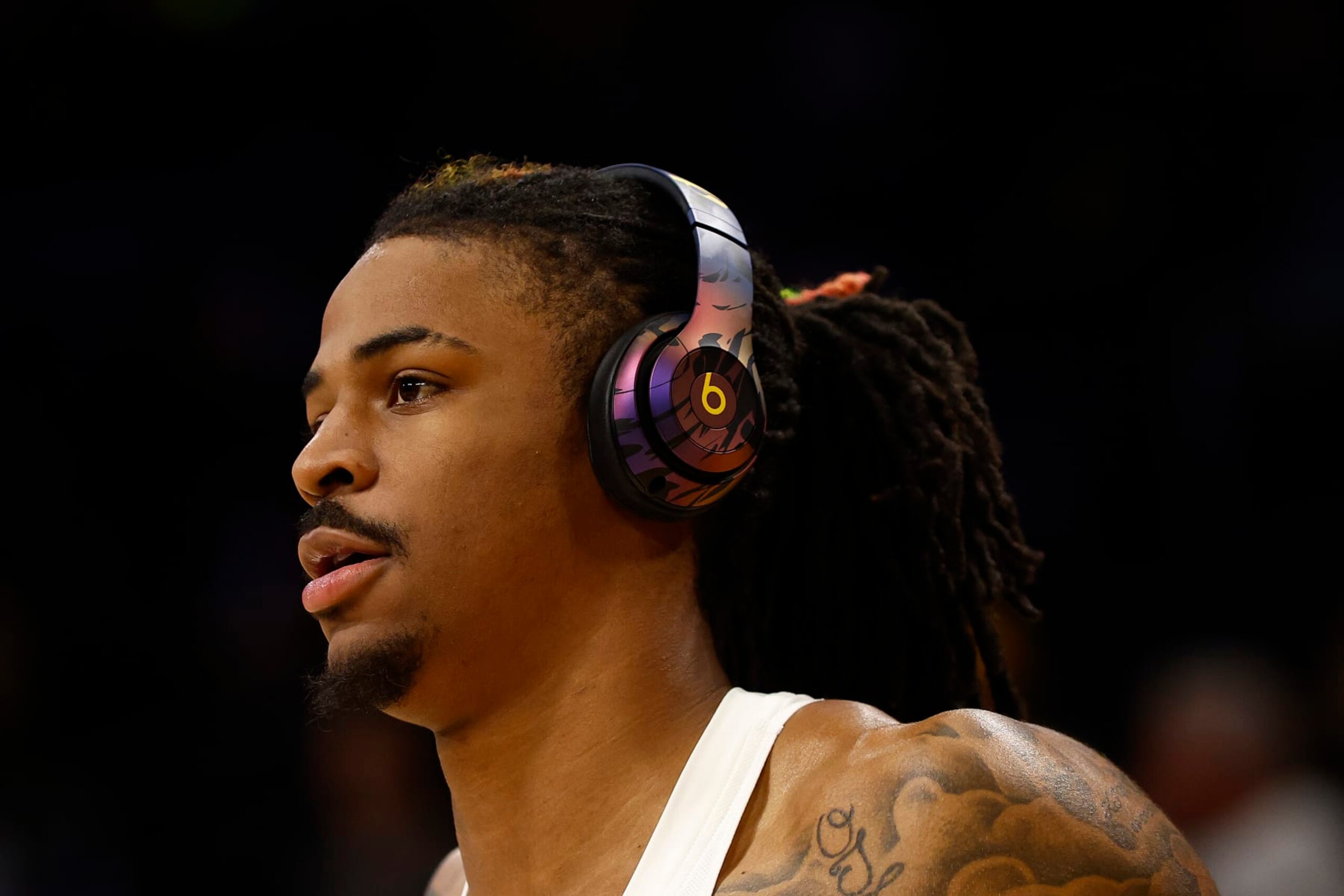 LOS ANGELES, CALIFORNIA - APRIL 28:  Ja Morant #12 of the Memphis Grizzlies warms up before play against the Los Angeles Lakers in Game Six of the Western Conference First Round Playoffs at Crypto.com Arena on April 28, 2023 in Los Angeles, California.  NOTE TO USER: User expressly acknowledges and agrees that, by downloading and/or using this photograph, user is consenting to the terms and conditions of the Getty Images License Agreement. (Photo by Ronald Martinez/Getty Images)