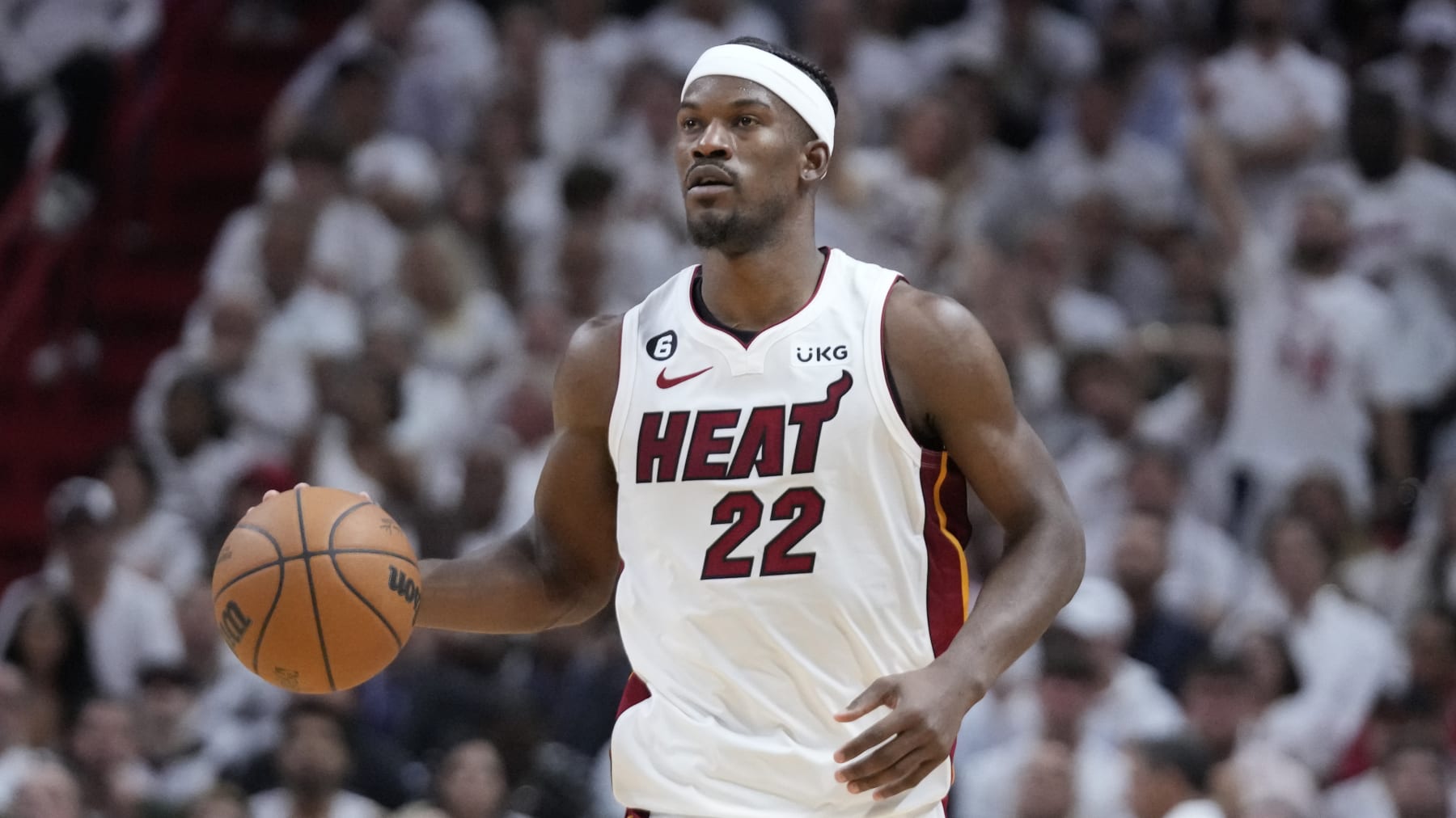 Miami Heat forward Jimmy Butler (22) looks to pass the ball during the first half of Game 4 of the basketball NBA Finals against the Denver Nuggets, Friday, June 9, 2023, in Miami. (AP Photo/Wilfredo Lee)