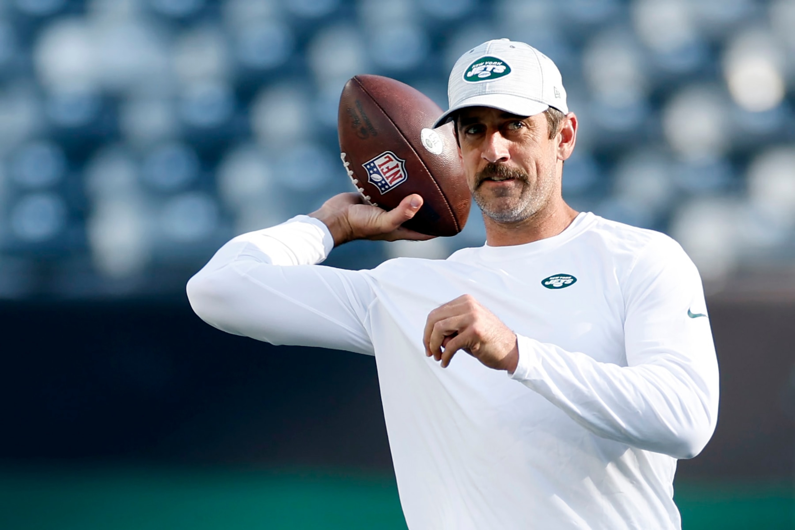 EAST RUTHERFORD, NEW JERSEY - AUGUST 19: Aaron Rodgers #8 of the New York Jets throws the ball during warmups before the first half of a preseason game against the Tampa Bay Buccaneers at MetLife Stadium on August 19, 2023 in East Rutherford, New Jersey. (Photo by Sarah Stier/Getty Images)