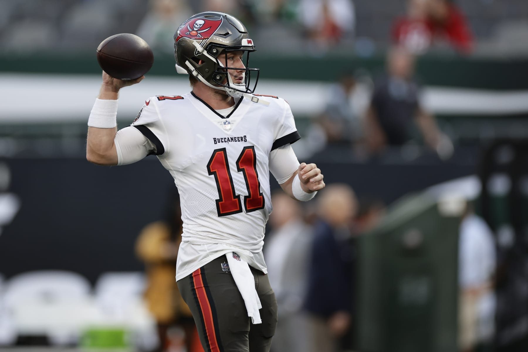 Tampa Bay Buccaneers quarterback John Wolford (11) warms up before a preseason NFL football game against the New York Jets, Saturday, Aug. 19, 2023, in East Rutherford, N.J. (AP Photo/Adam Hunger)