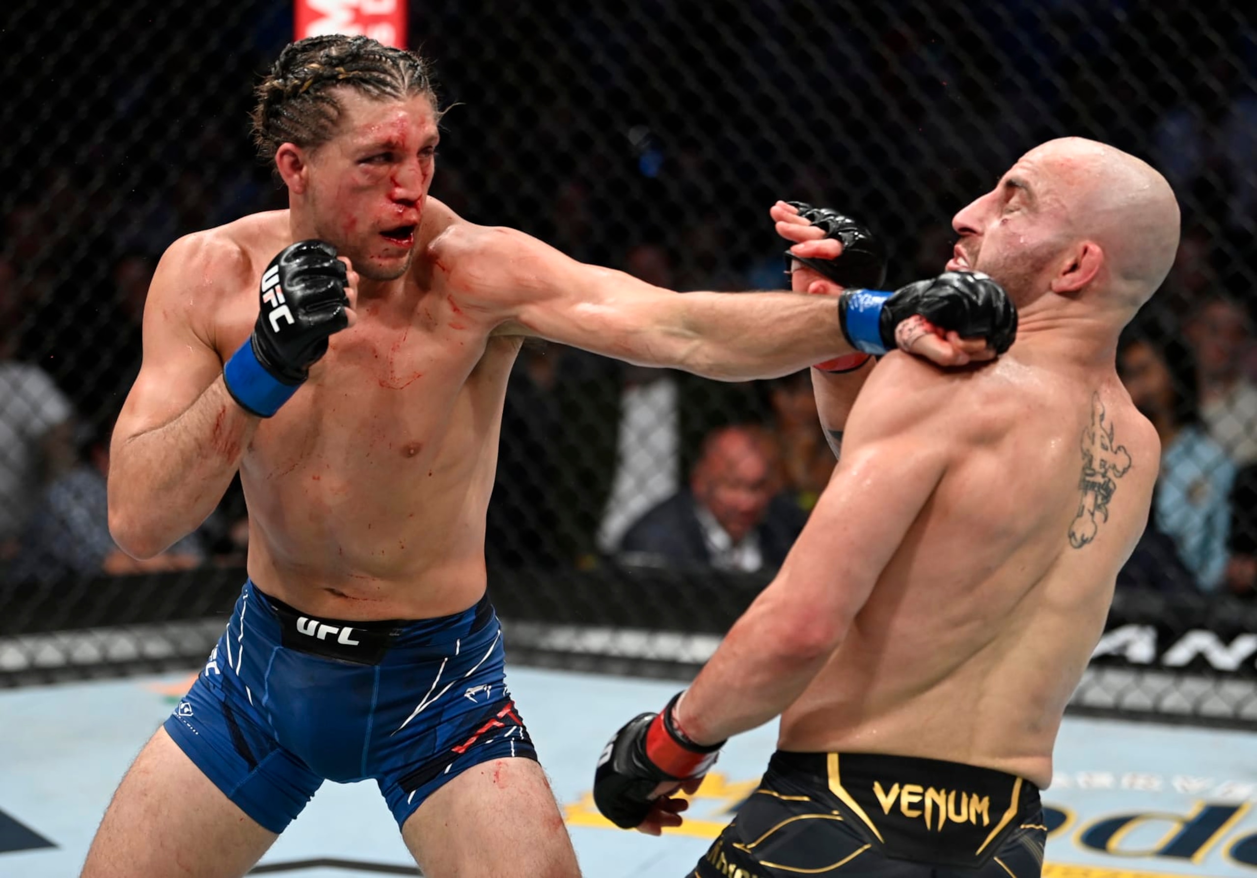 Brian Ortega lands a punch on Alexander Volkanovski