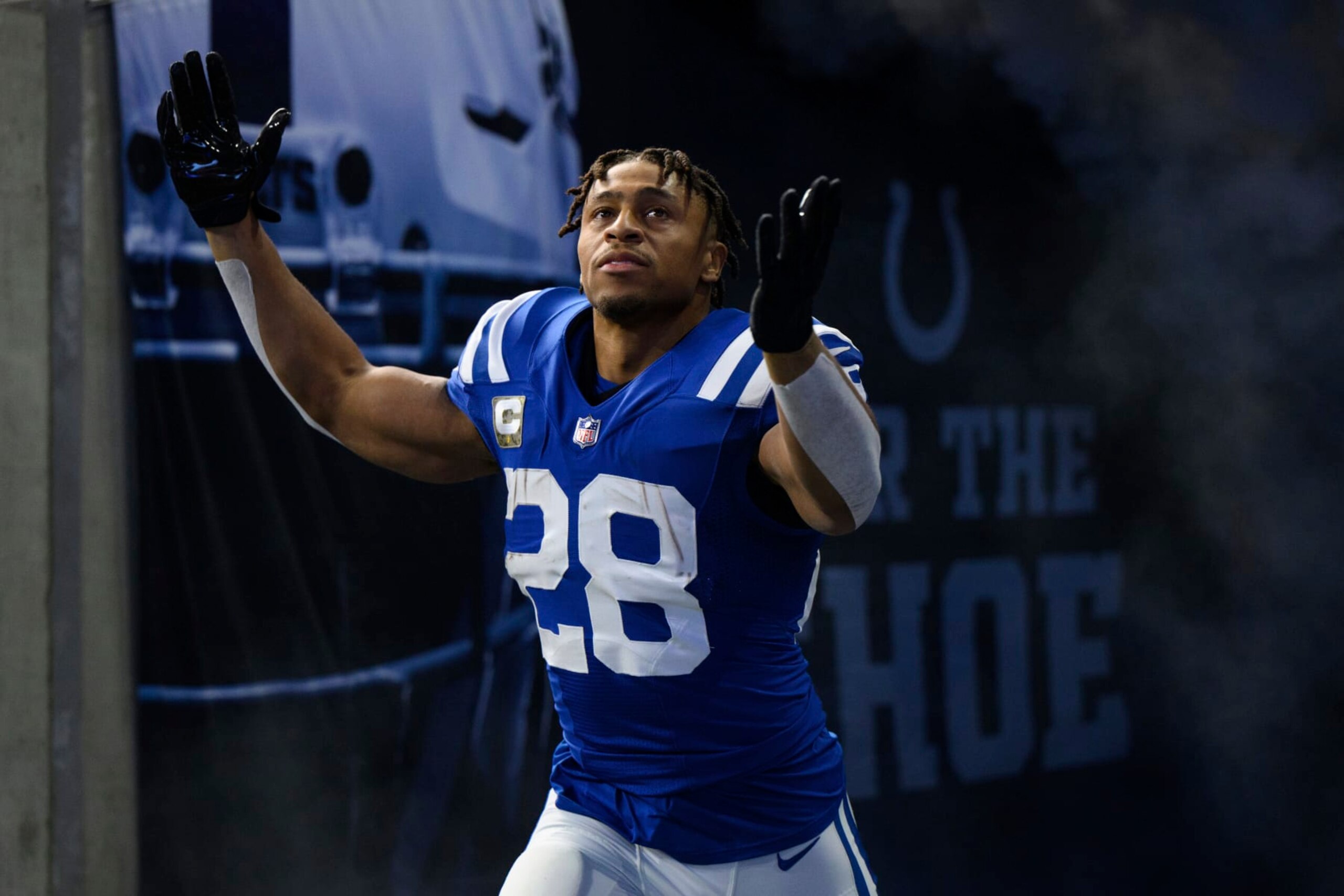 Indianapolis Colts running back Jonathan Taylor (28) gets introduced before an NFL football game against the Philadelphia Eagles, Sunday, Nov. 20, 2022, in Indianapolis. (AP Photo/Zach Bolinger)