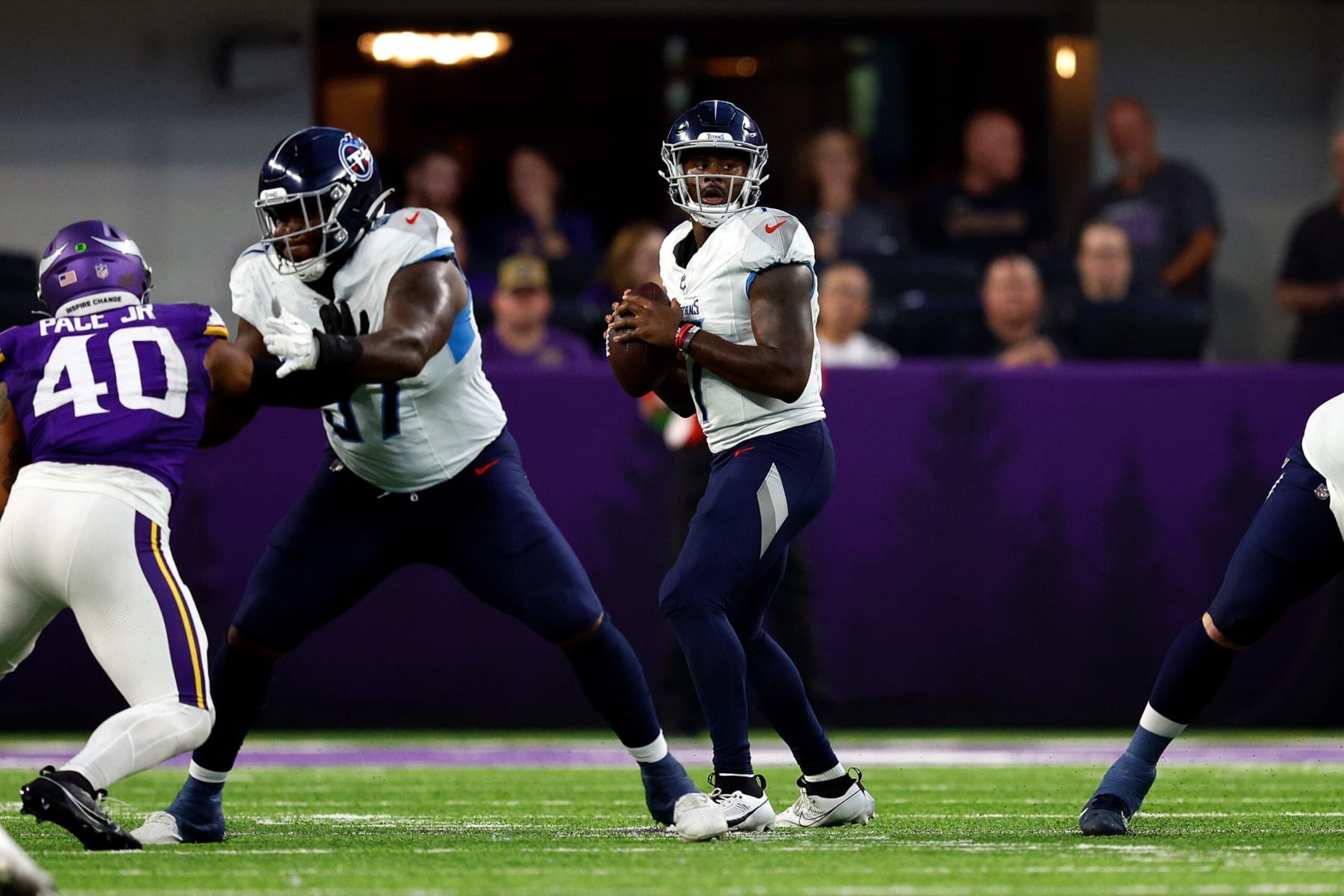 MINNEAPOLIS, MINNESOTA - AUGUST 19: Malik Willis #7 of the Tennessee Titans looks to pass against the Minnesota Vikings in the first half during a preseason game at U.S. Bank Stadium on August 19, 2023 in Minneapolis, Minnesota. (Photo by David Berding/Getty Images) MINNEAPOLIS, MINNESOTA - AUGUST 19: Malik Willis #7 of the Tennessee Titans looks to pass against the Minnesota Vikings in the first half during a preseason game at U.S. Bank Stadium on August 19, 2023 in Minneapolis, Minnesota. (Photo by David Berding/Getty Images)