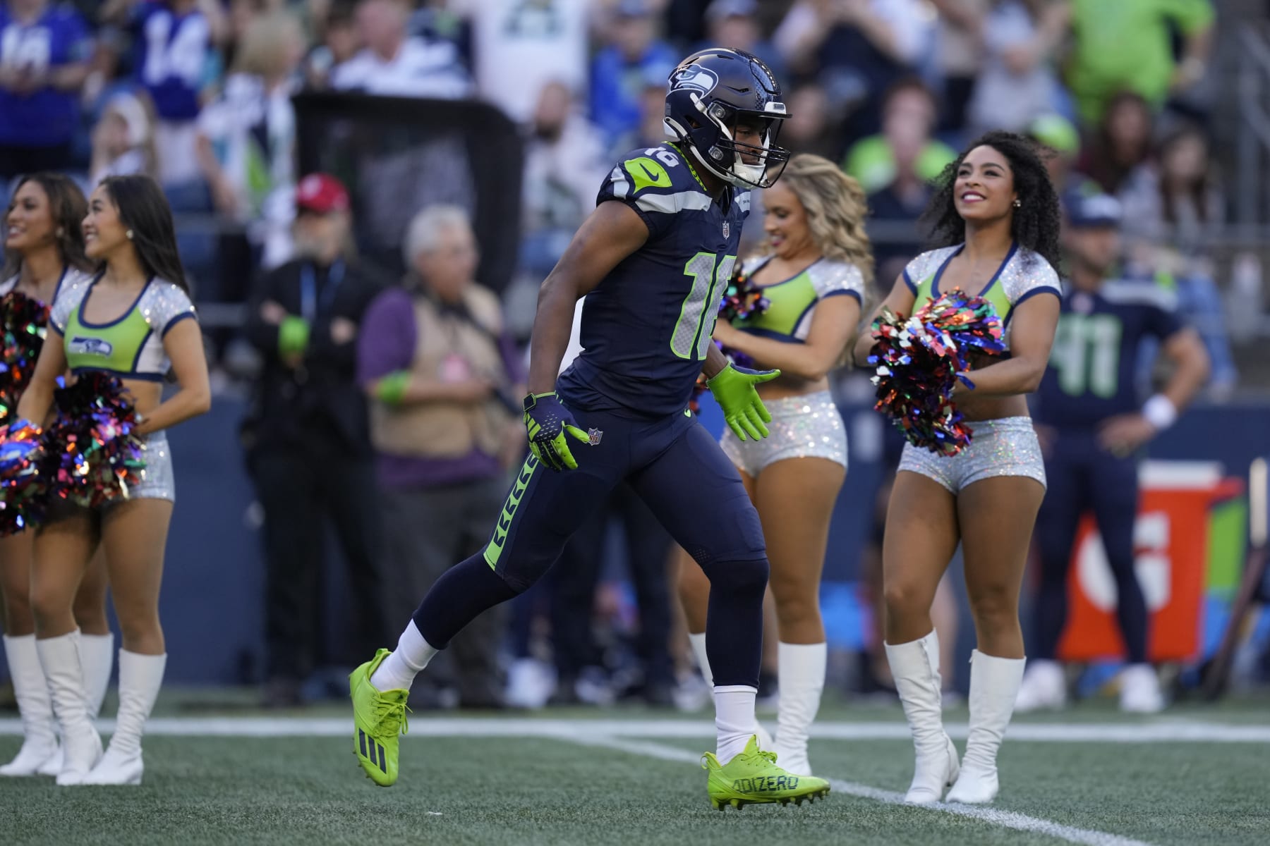 Seattle Seahawks wide receiver Tyler Lockett (16) runs on the field before an NFL pre-season football game against the Minnesota Vikings, Thursday, Aug. 10, 2023 in Seattle. (AP Photo/Ben VanHouten)